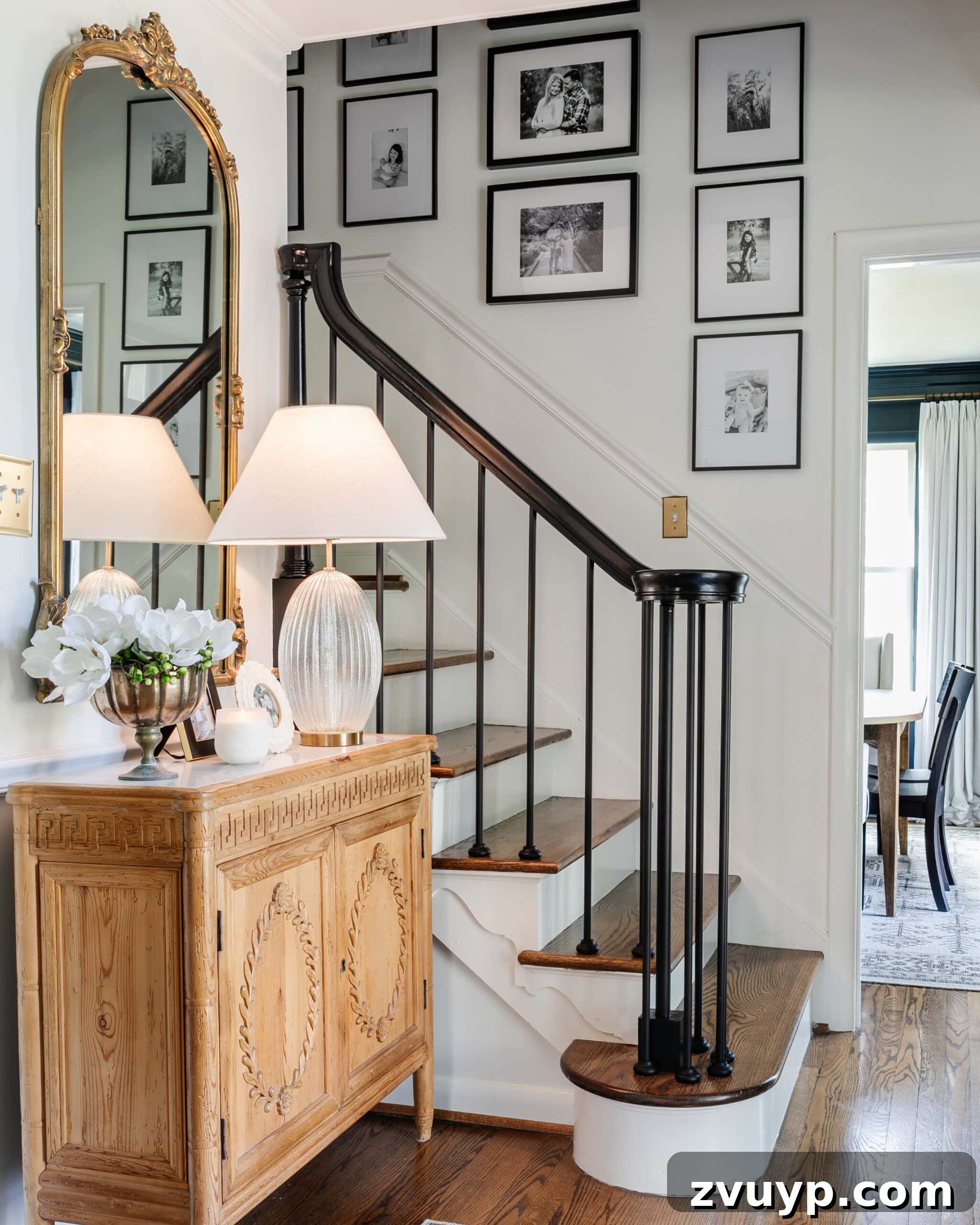 Expert Interior Paint Color Selection for Your Home 17 lamp with 3000K light bulb on an entryway table in a foyer painted Benjamin Moore Chantilly Lace