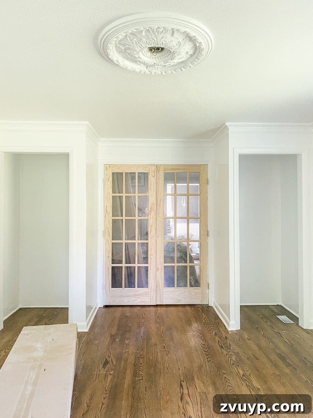 Initial stage of the home office with newly built closet frames, before doors and shelves