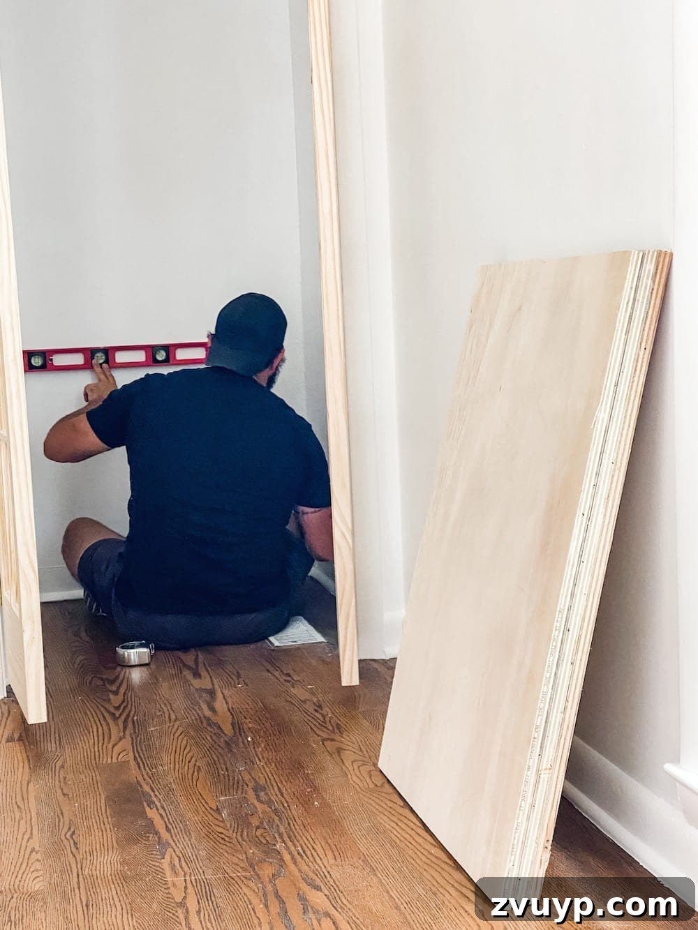 Plywood being cut with a circular saw for closet shelves