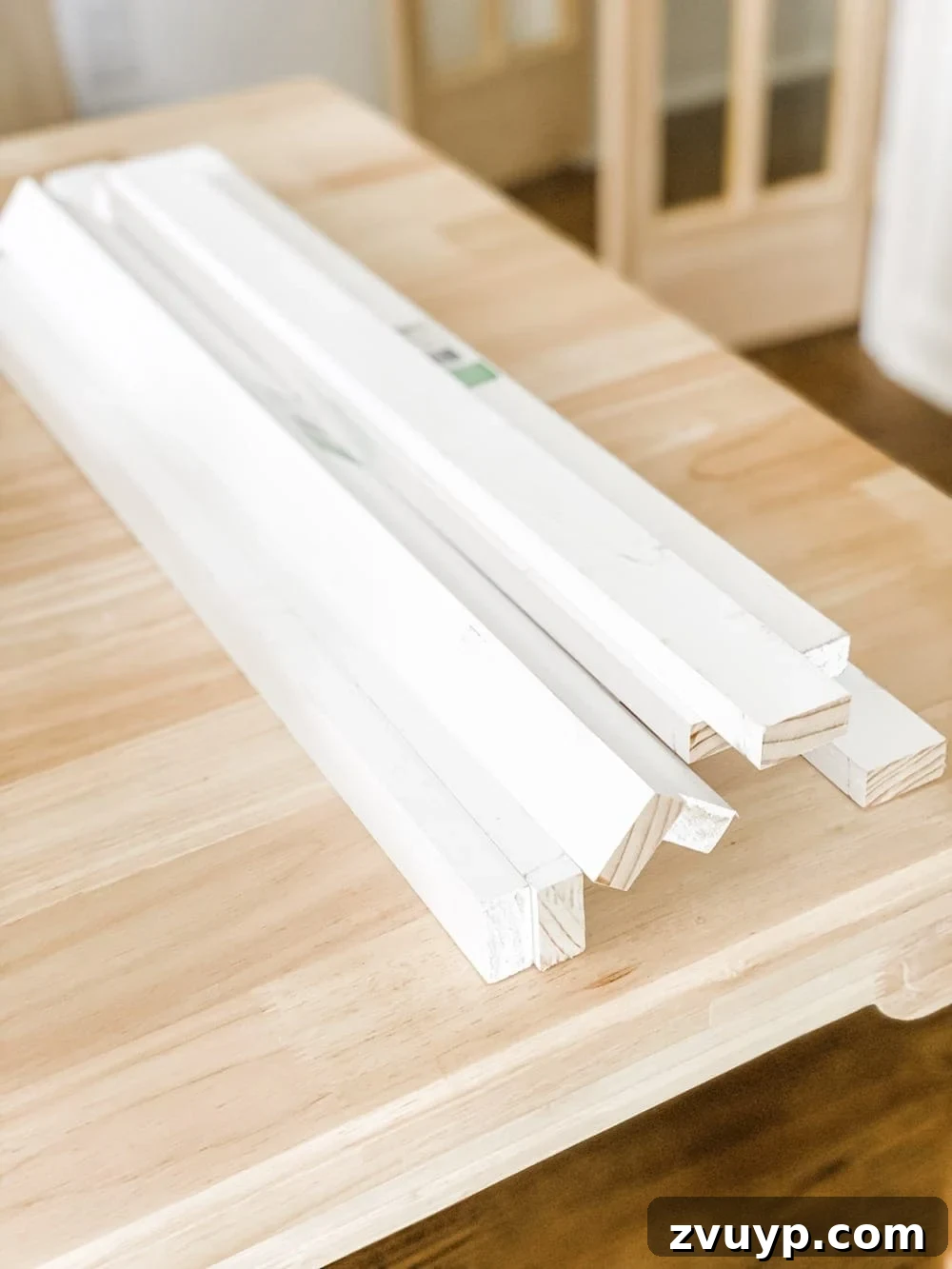 1x2 wooden boards cut to length for shelf braces