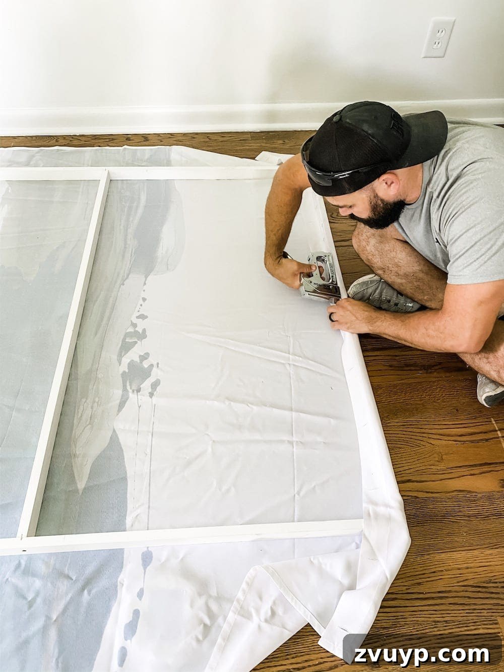 Transform a Shower Curtain into Statement Wall Art 9 Flipped DIY canvas frame with shower curtain facing down, ready for stapling.