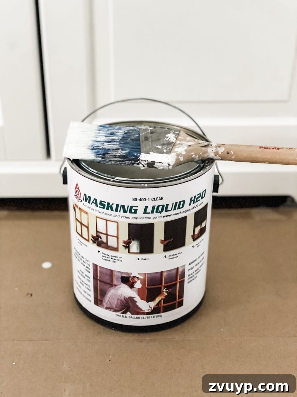 IKEA Cabinet Hack Hale Navy Office Refresh 3 Applying Masking Liquid to IKEA Liatorp Glass Doors for a Perfect Paint Finish