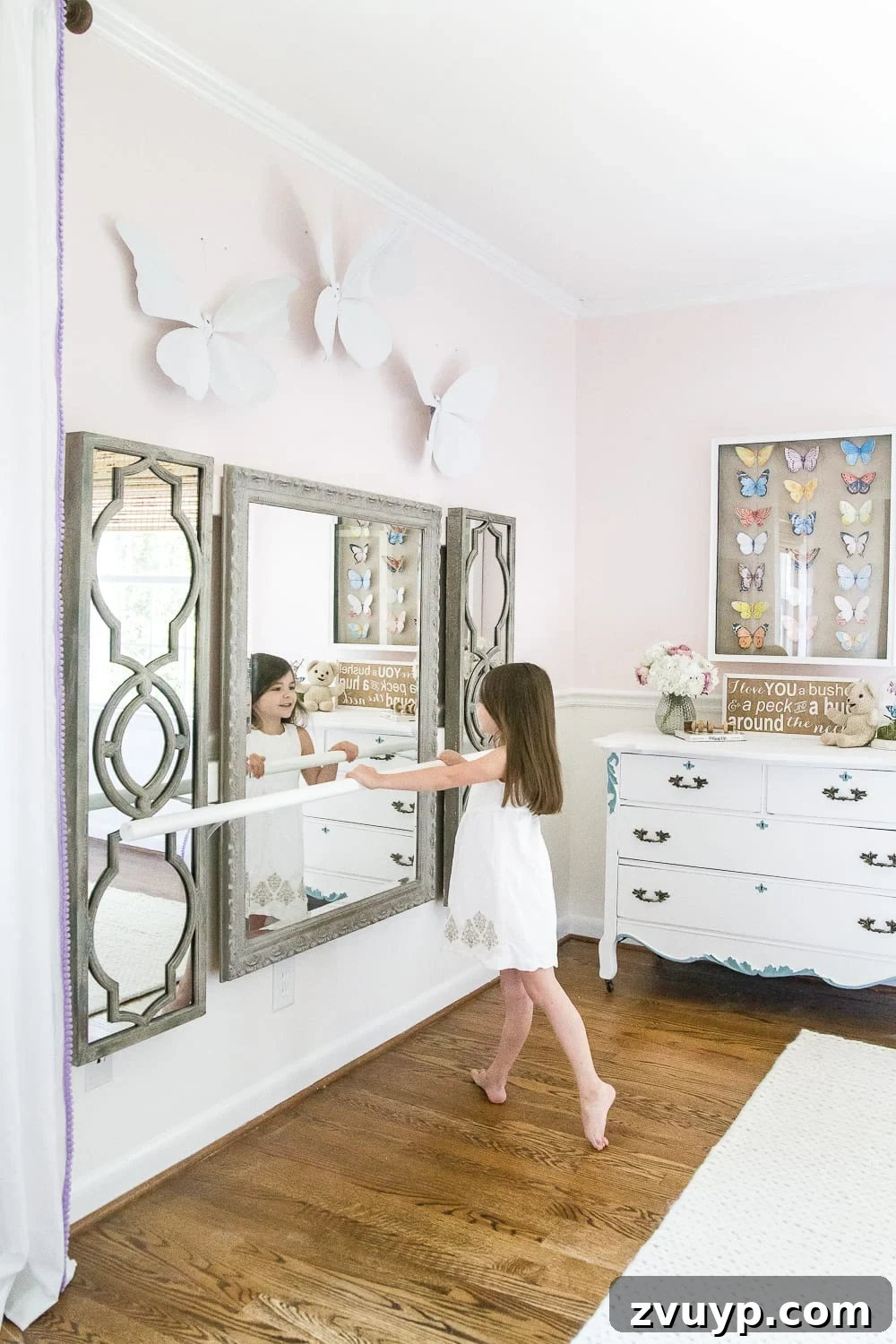 Back-to-School Homework Space for Olivia 2 Old DIY ballet barre in a little girl's room, part of a whimsical butterfly-themed bedroom before the study space makeover.