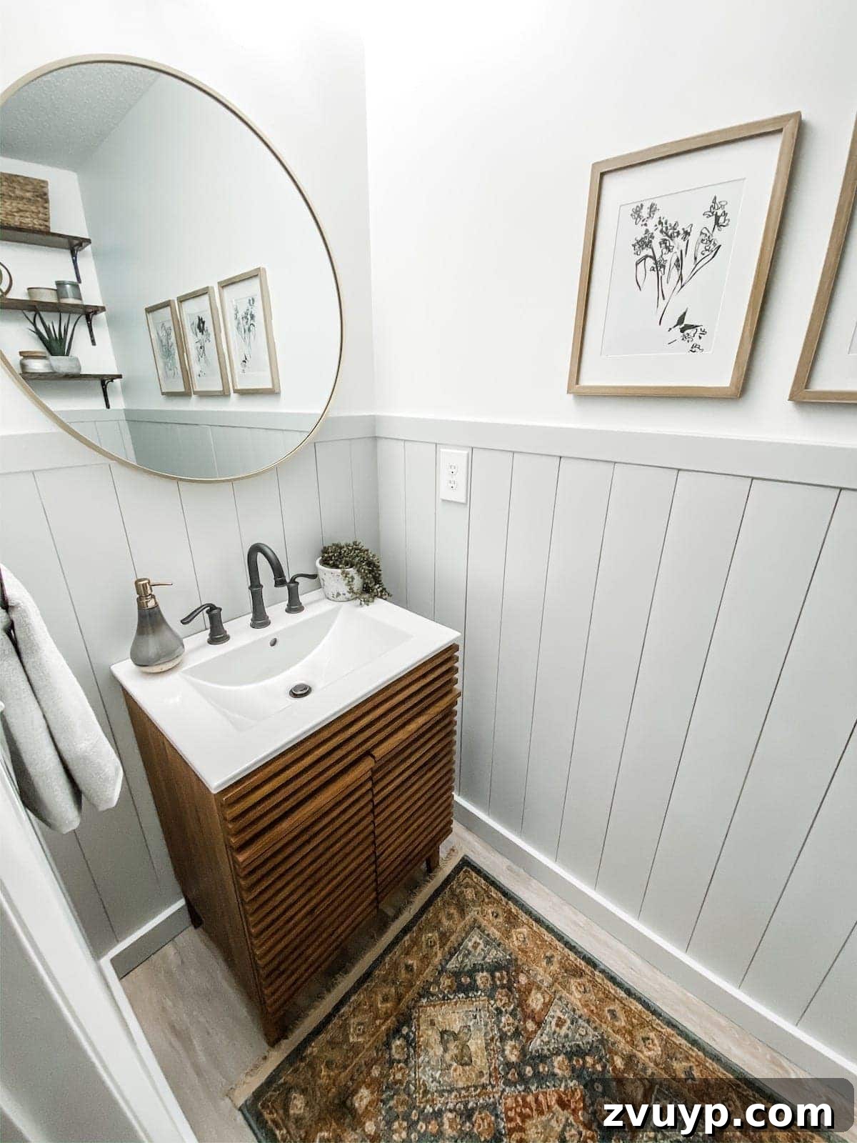 Golden State Powder Room Serenity 6 Powder room with elegant gray vertical shiplap wainscoting and freshly painted white walls