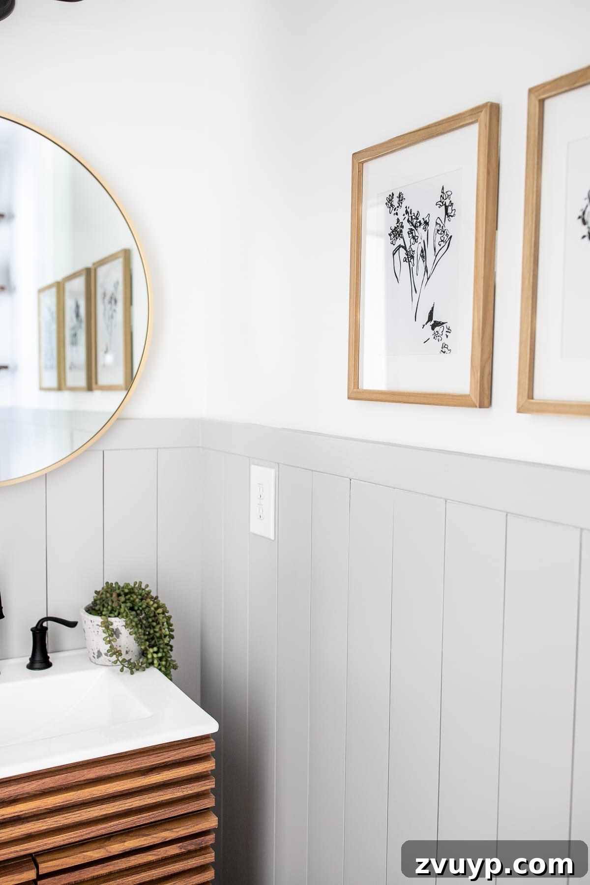 Golden State Powder Room Serenity 9 California Casual modern powder room with minimalist botanical art prints and a round gold mirror