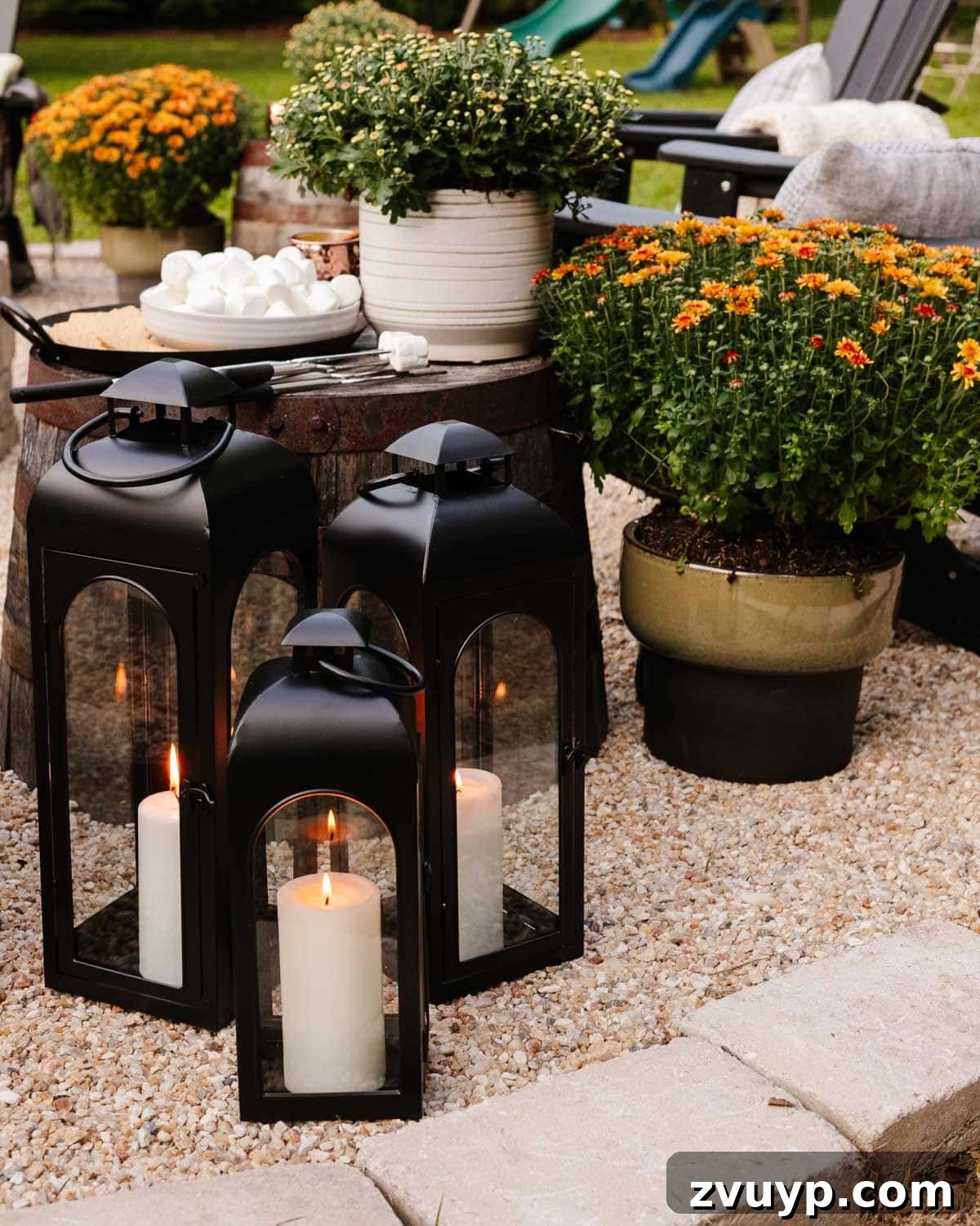 Create Your Cozy Fall Haven: DIY Decor Ideas 18 lanterns in a backyard around a cozy fire pit