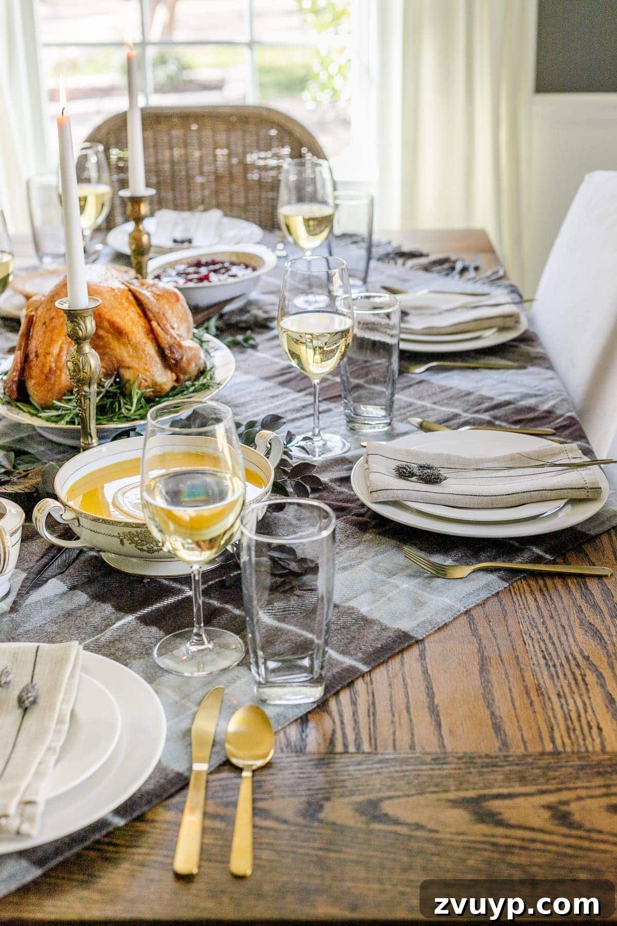 Create Your Cozy Fall Haven: DIY Decor Ideas 25 plaid throw blanket used on a dining table as a tablecloth to set the mood of a cozy home
