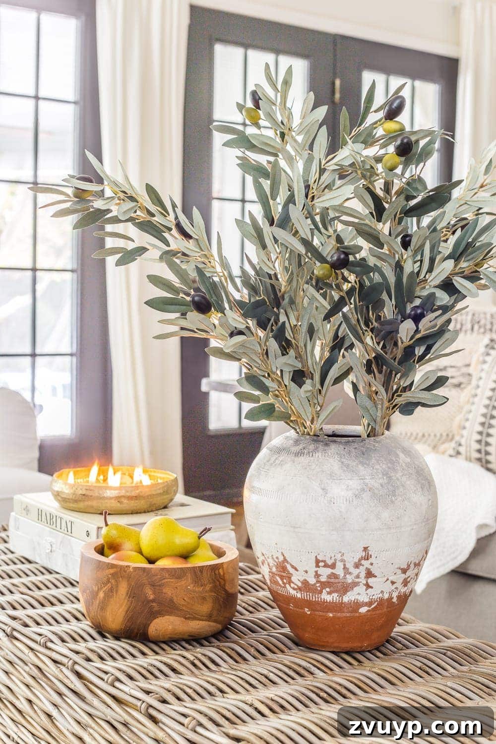 Create Your Cozy Fall Haven: DIY Decor Ideas 8 terracotta vase with olive branches wooden bowl with pears and fall candle