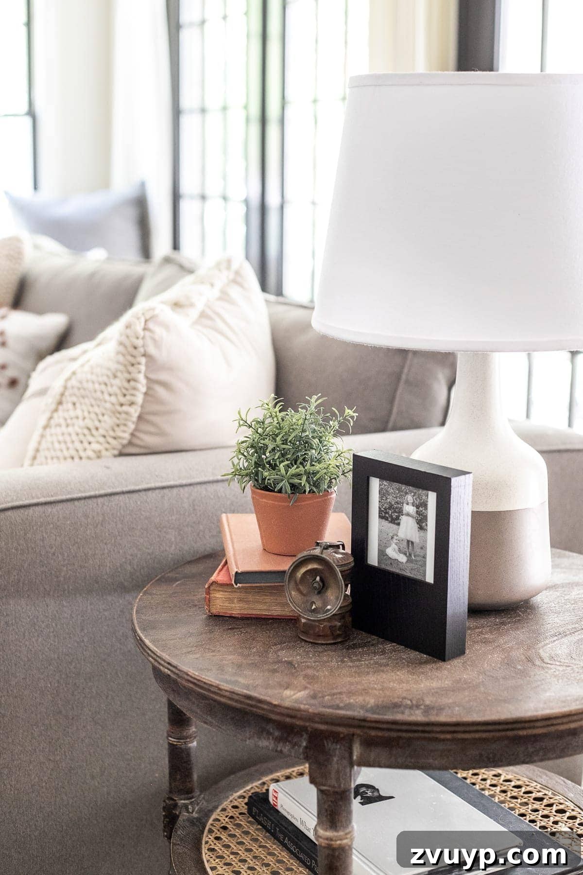 An Earthy Fall Living Room and My Go-To Budget Fall Decor Capsule 6 Stylish living room end table decor featuring a mix of textures and materials, creating a cohesive and inviting vignette.