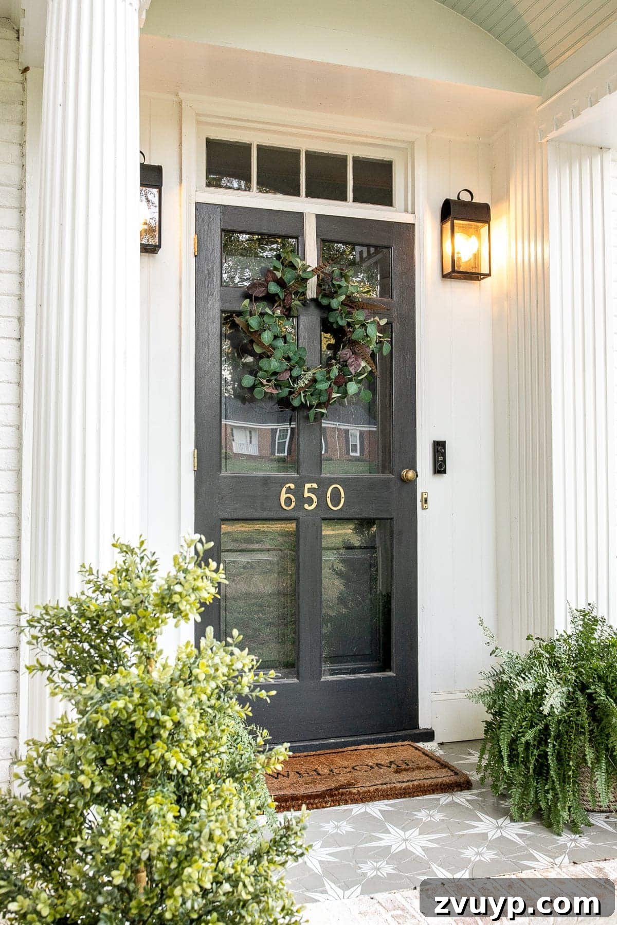 Handmade Eucalyptus and Feather Autumn Wreath 2 Front porch decorated for early fall with DIY wreath and stenciled floor