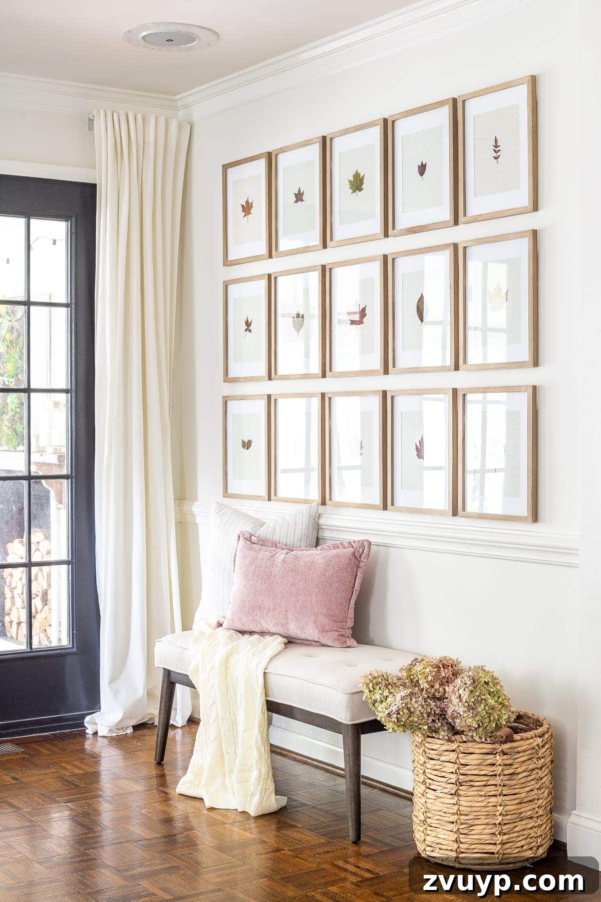 Pressed Leaf Gallery Wall: Autumn Entry Decor 11 Elegantly decorated entryway for fall with a stunning pressed leaf gallery wall and a charming basket of dried hydrangeas