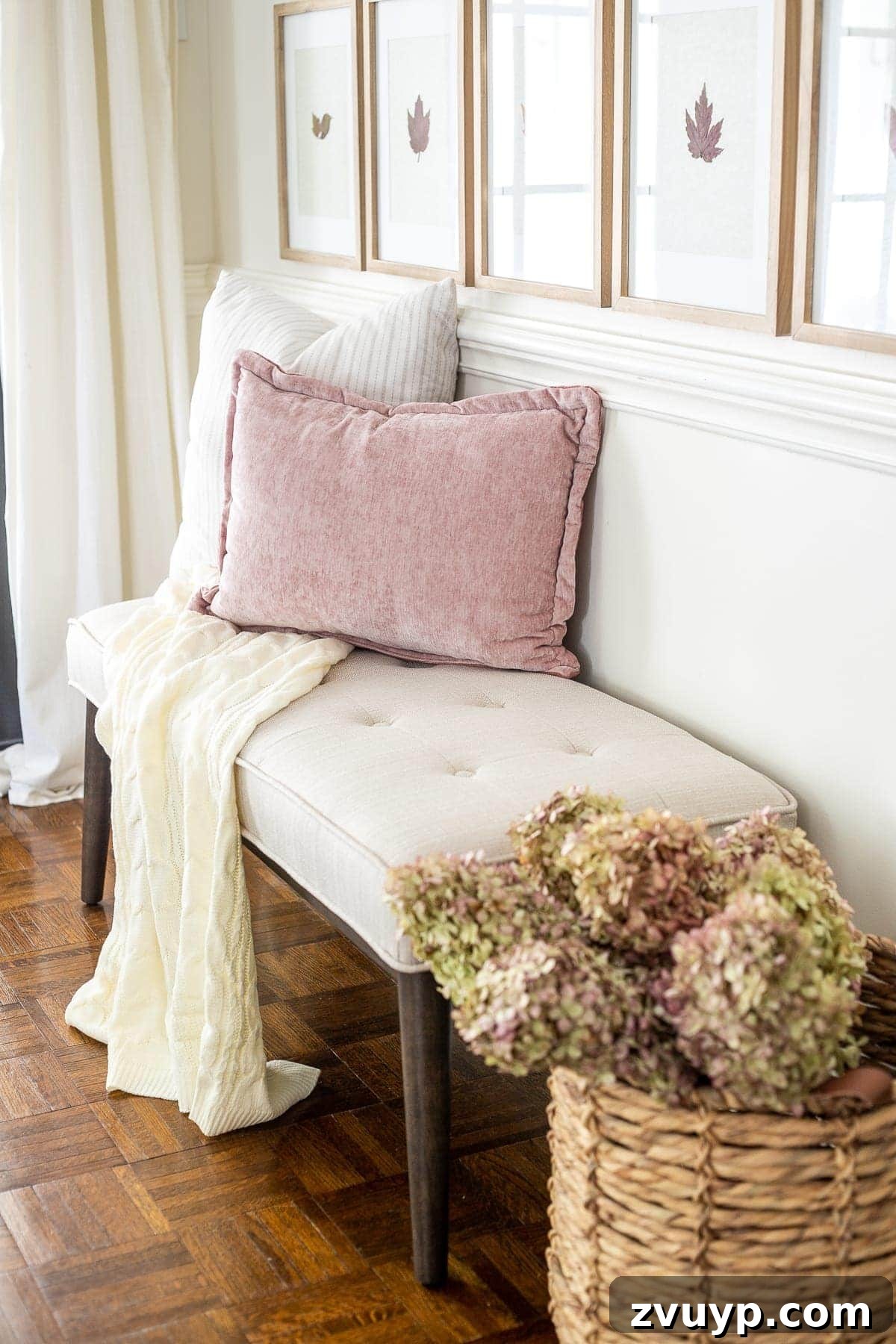 Pressed Leaf Gallery Wall: Autumn Entry Decor 5 Entryway bench styled with a blush pillow and a basket of dried hydrangeas, complementing the fall theme