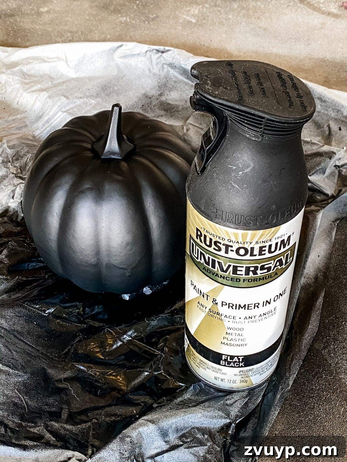 Modern Pumpkin Makeovers: 3 Creative Paint Ideas 9 Fake pumpkin sprayed with flat black paint