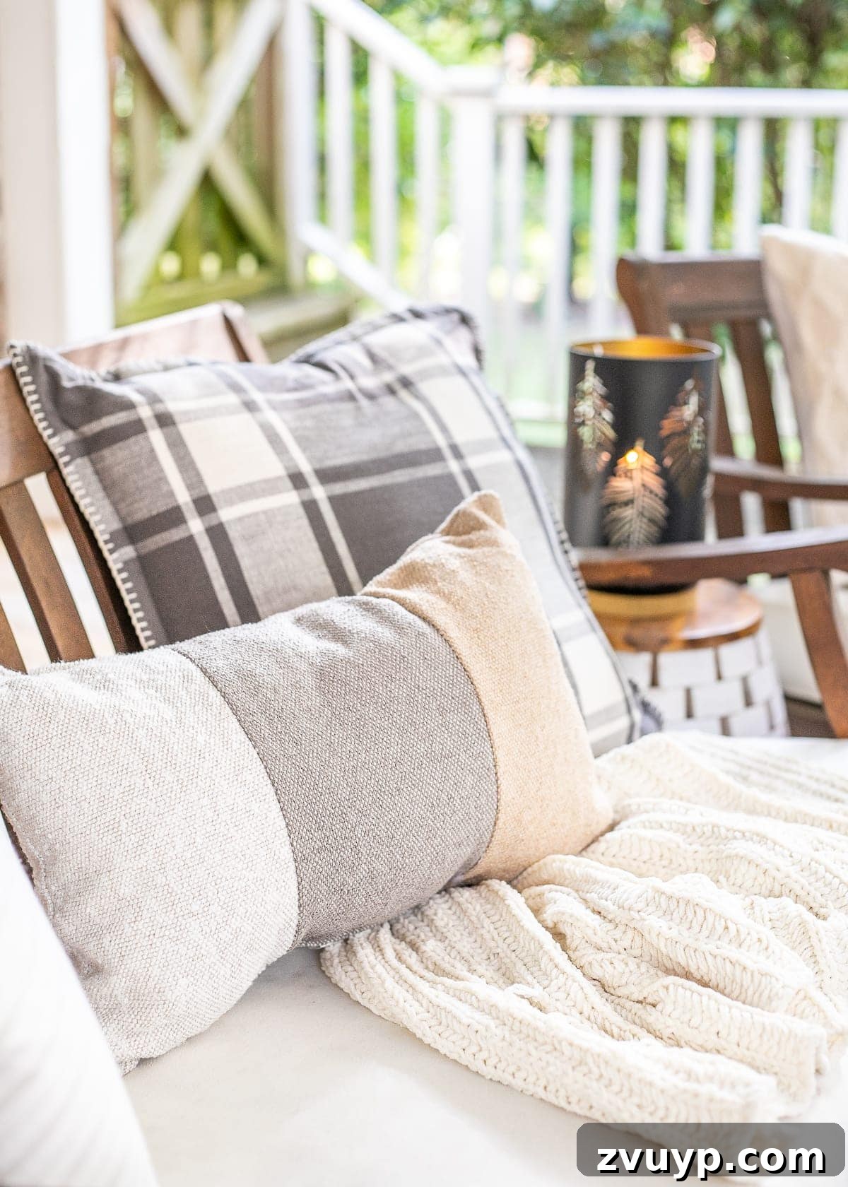 Cozy Fall Outdoor Decor Fall outdoor decor on a back porch with cozy seating and lighting
