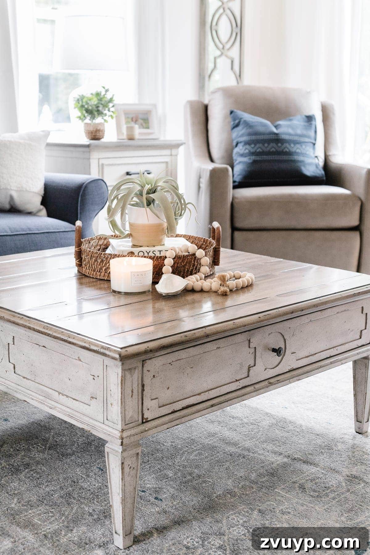 McNay Home Modern Coastal Living Revealed 12 Close-up of the Bella side table with decor and charging capabilities