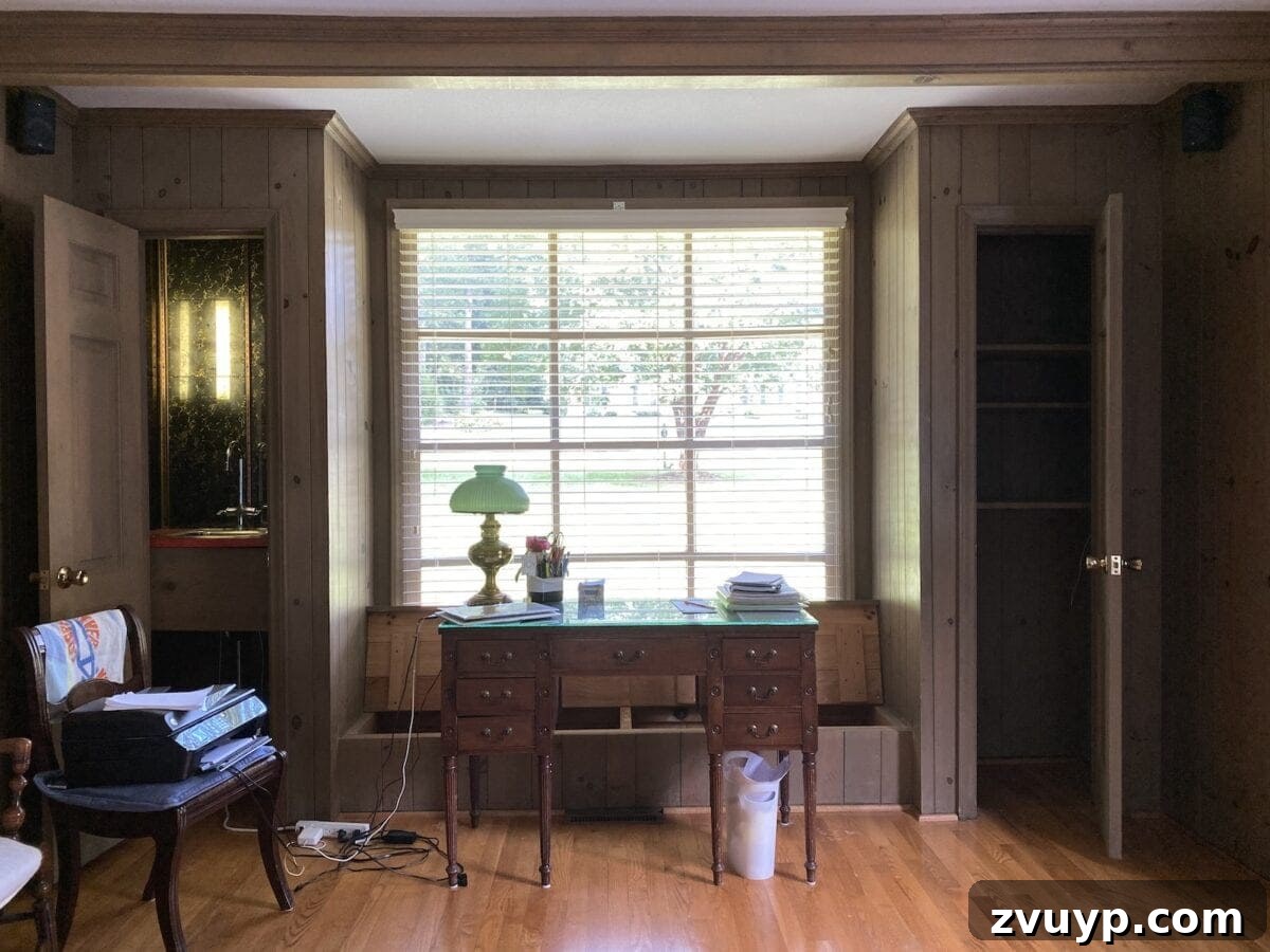 McNay Home Modern Coastal Living Revealed 14 Before image of the living room with old, small closets and a window seat