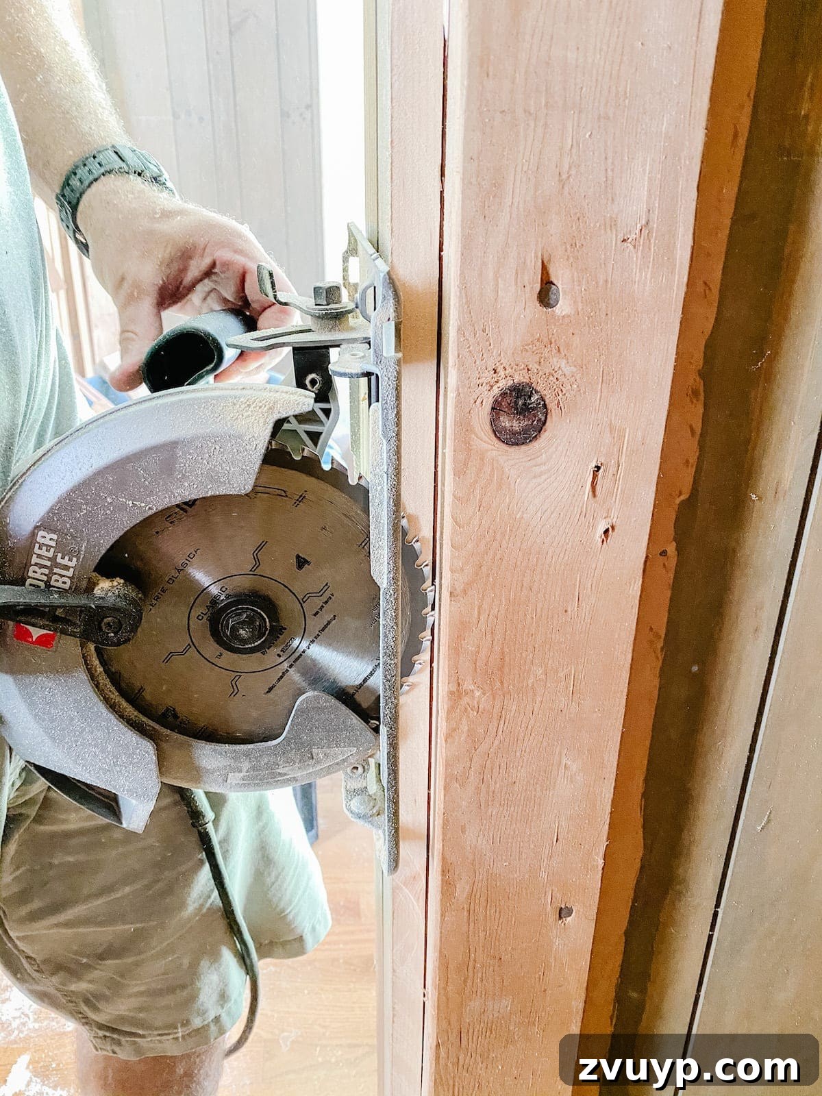 Transform Closets into Seamless Built-In Shelving 6 Circular saw cutting open a closet for built-in shelving