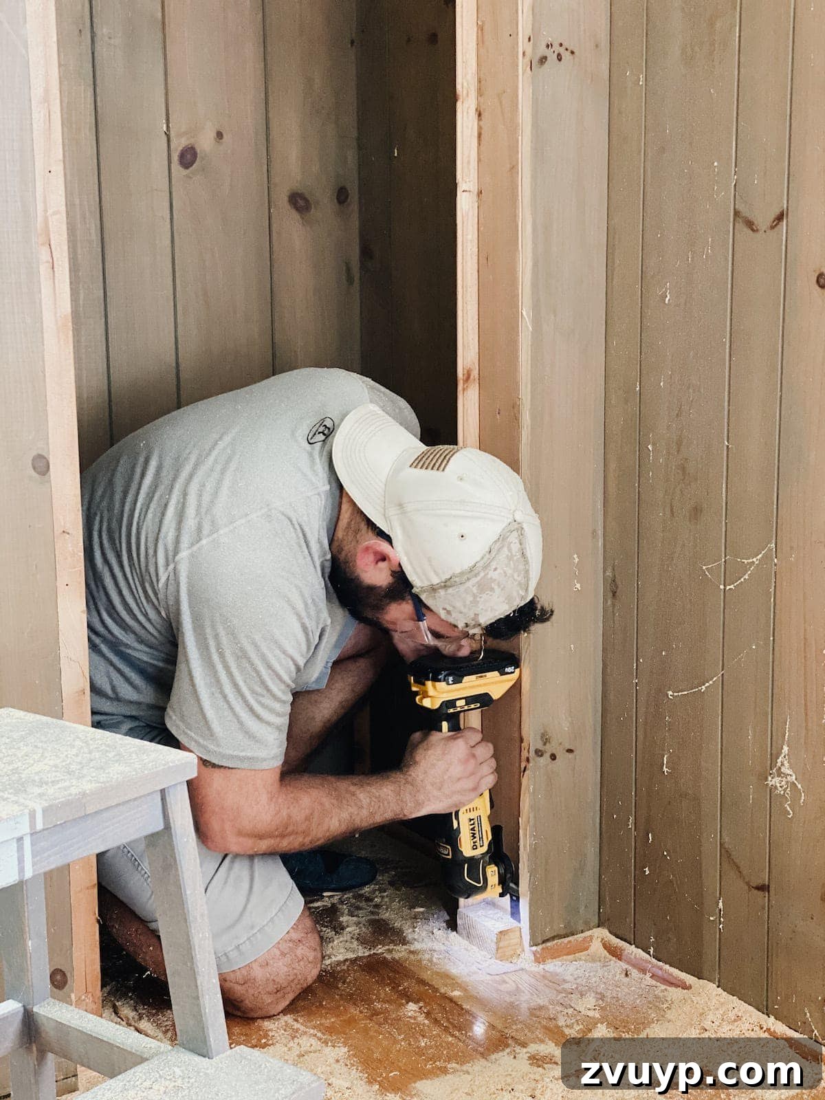 Transform Closets into Seamless Built-In Shelving 7 Oscillating multi-tool being used to trim edges for built-in shelves