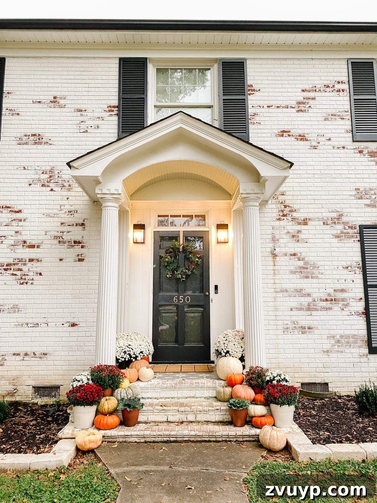 Autumn's Painted Porch 2 Colorful Fall Porch Stoop Decorated with Mums and Pumpkins with Limewashed Brick