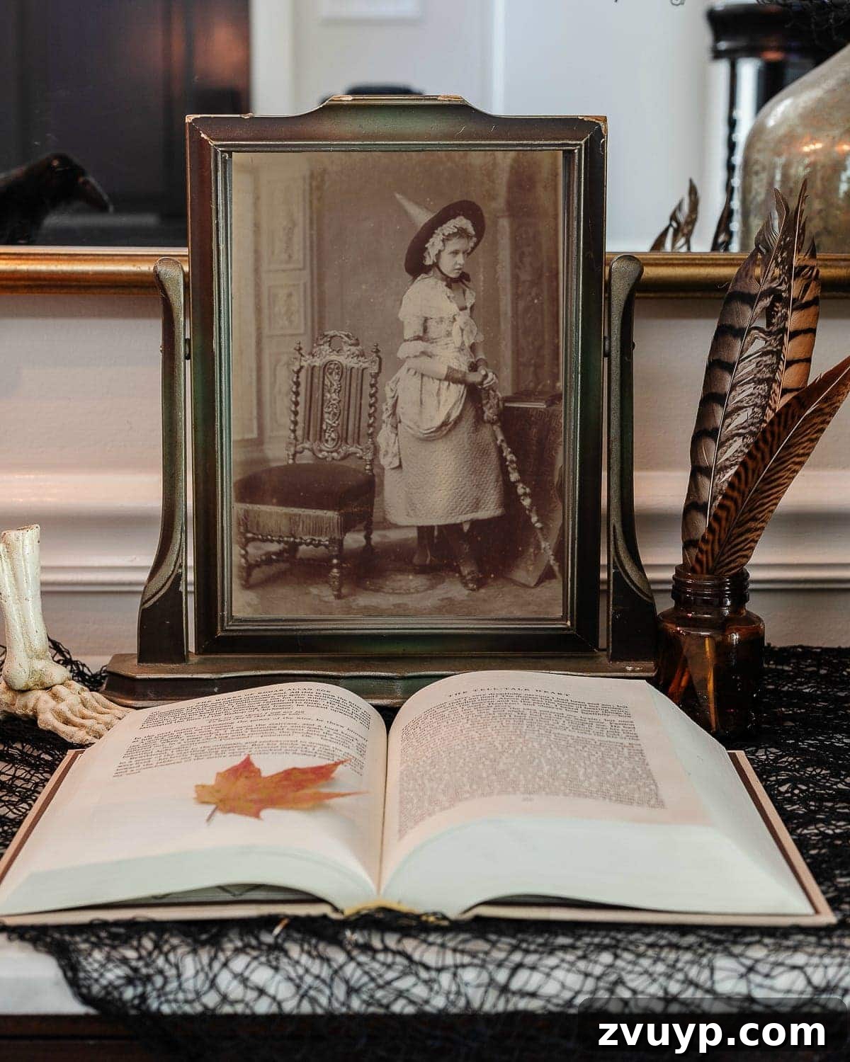Conjuring Classic Chills: 10 Vintage Halloween Prints for Your Entryway 13 A free printable featuring a brooding antique portrait, ideal for creating a sophisticated and spooky atmosphere.