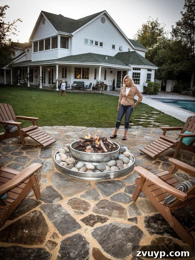 Elevate Your Outdoor Space: 15 Stunning Fire Pit Designs 18 Rustic DIY fire pit idea constructed with durable steel rings.