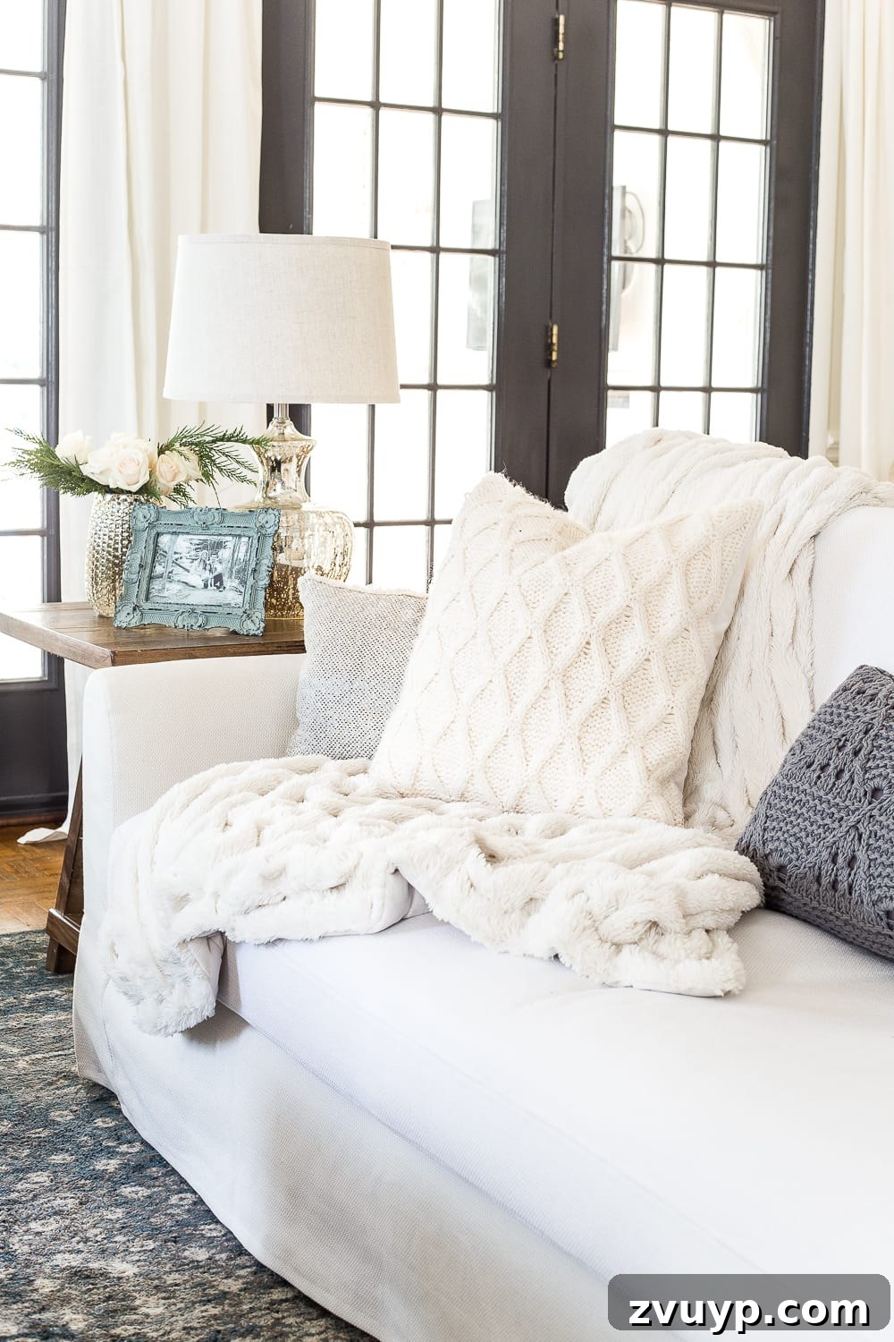 Living room with neutral decor and accent pillows
