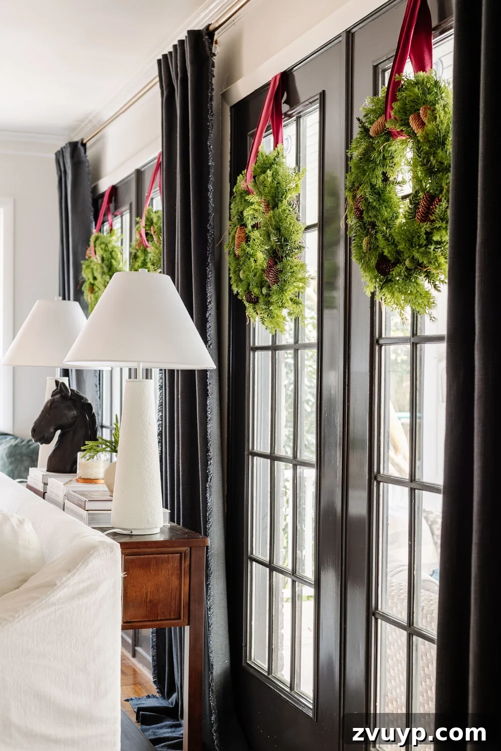hanging wreaths on windows for christmas holiday home decor