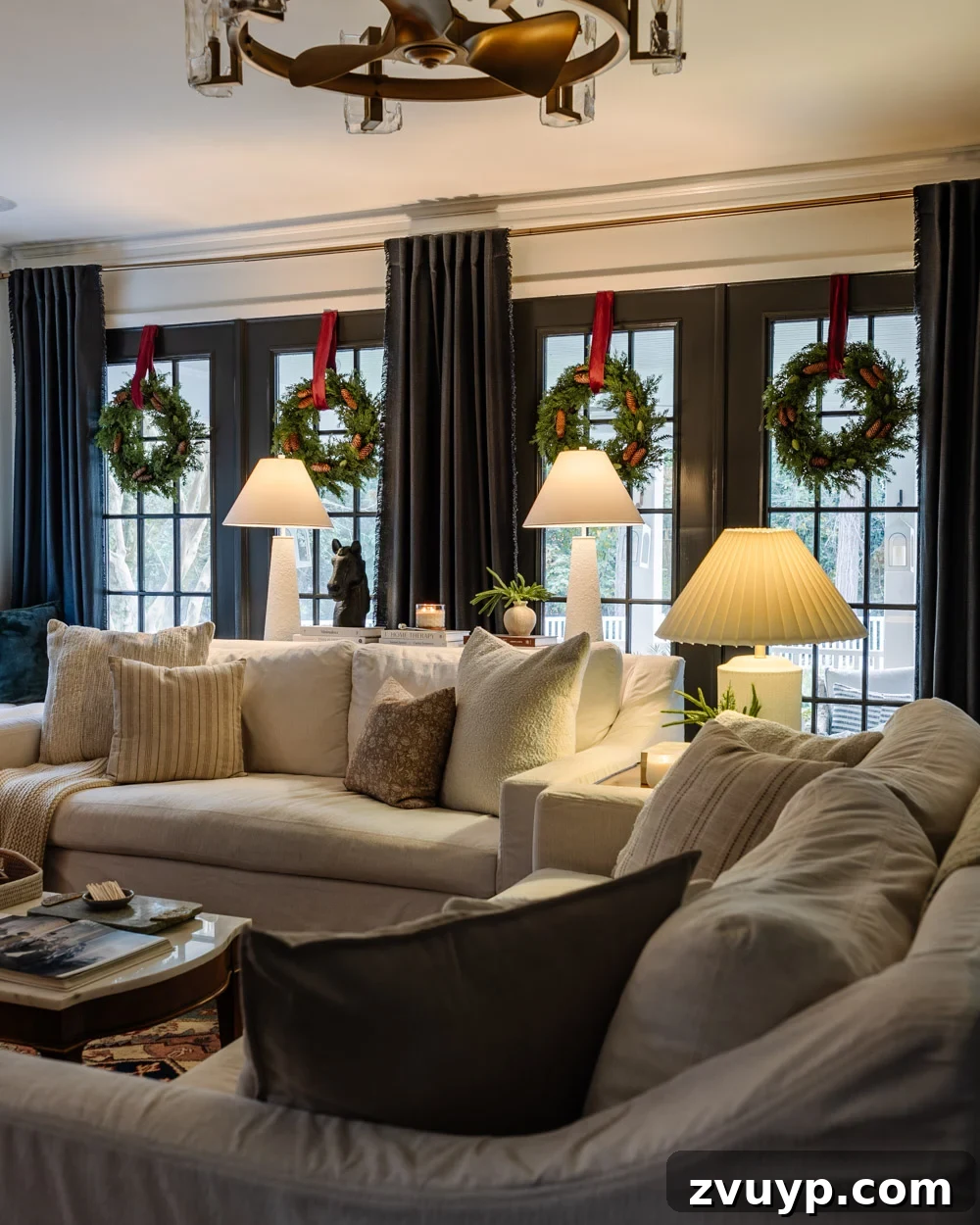 hanging window wreaths as living room Christmas decor inspiration