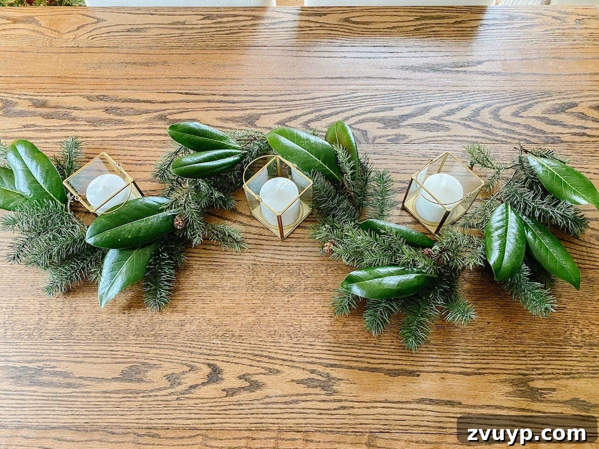 Crafting Natural Christmas Decor from Dried Fruit and Preserved Leaves 11 Adding preserved magnolia leaves to an artificial garland to enhance its natural appeal