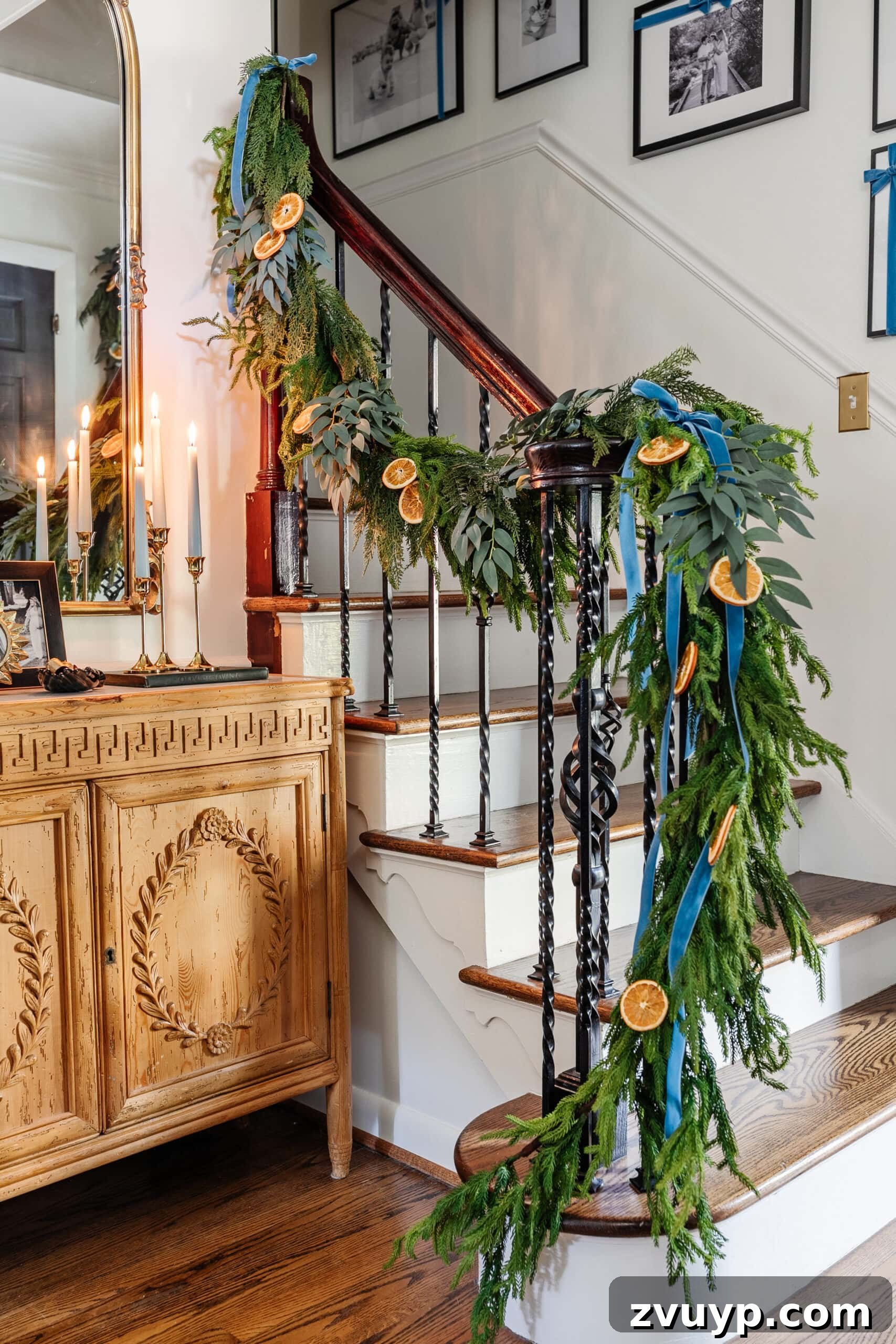 Crafting Natural Christmas Decor from Dried Fruit and Preserved Leaves 18 Staircase garland adorned with dried orange slices, ribbons, and natural elements