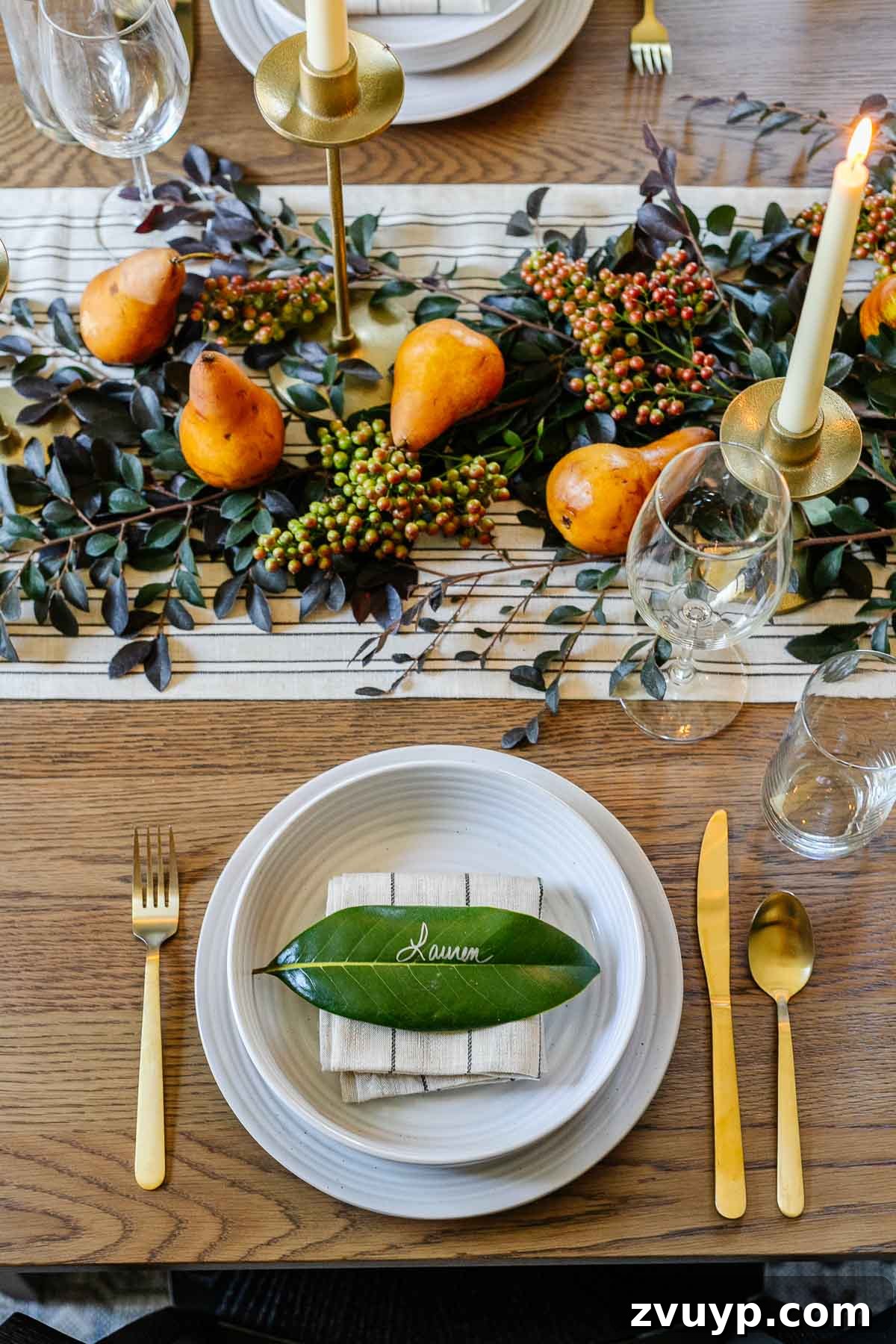 Crafting Natural Christmas Decor from Dried Fruit and Preserved Leaves 21 Magnolia leaf place card holder with a name written in metallic Sharpie for a Thanksgiving or Christmas table