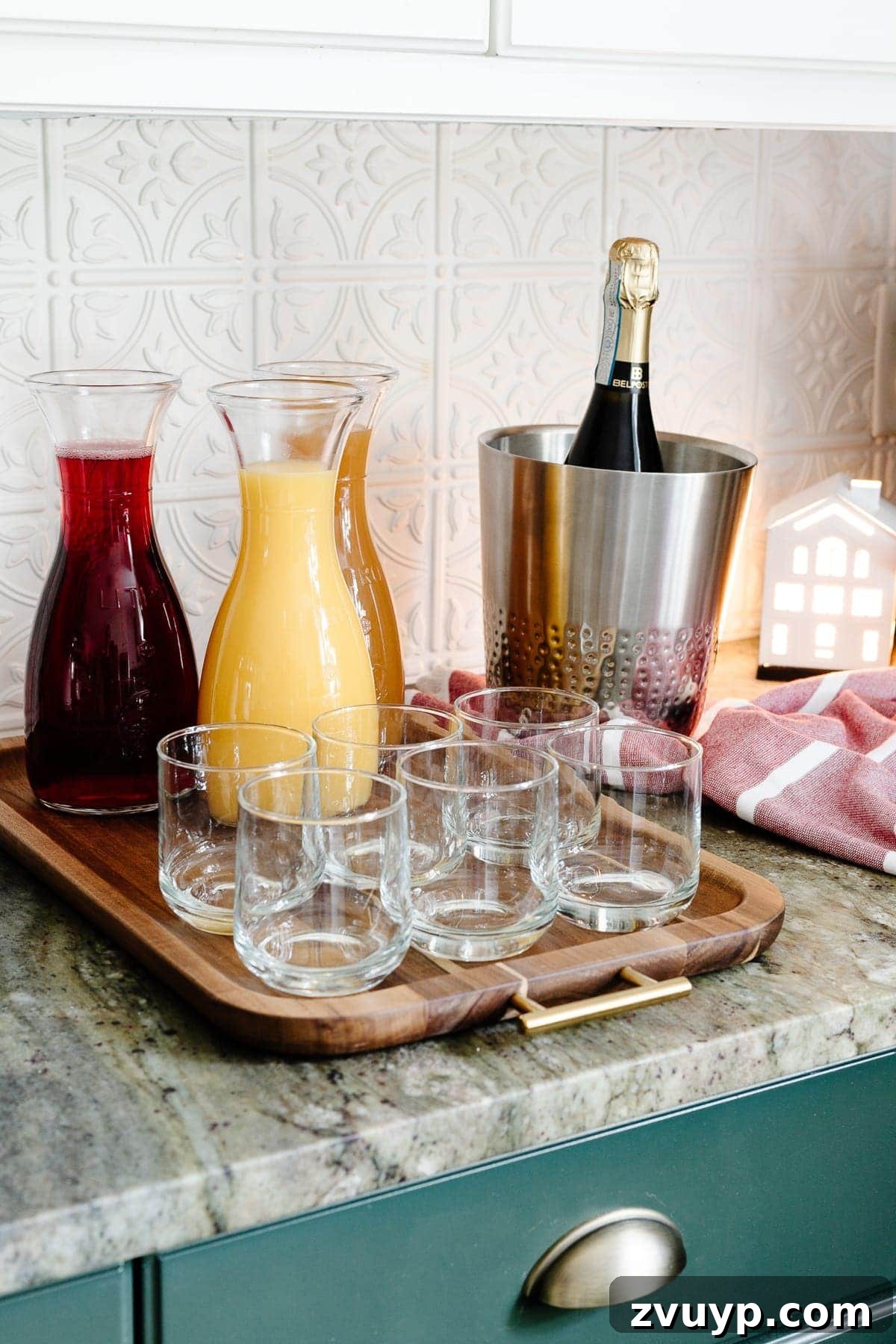 casual Christmas brunch mimosa bar with prosecco and juices