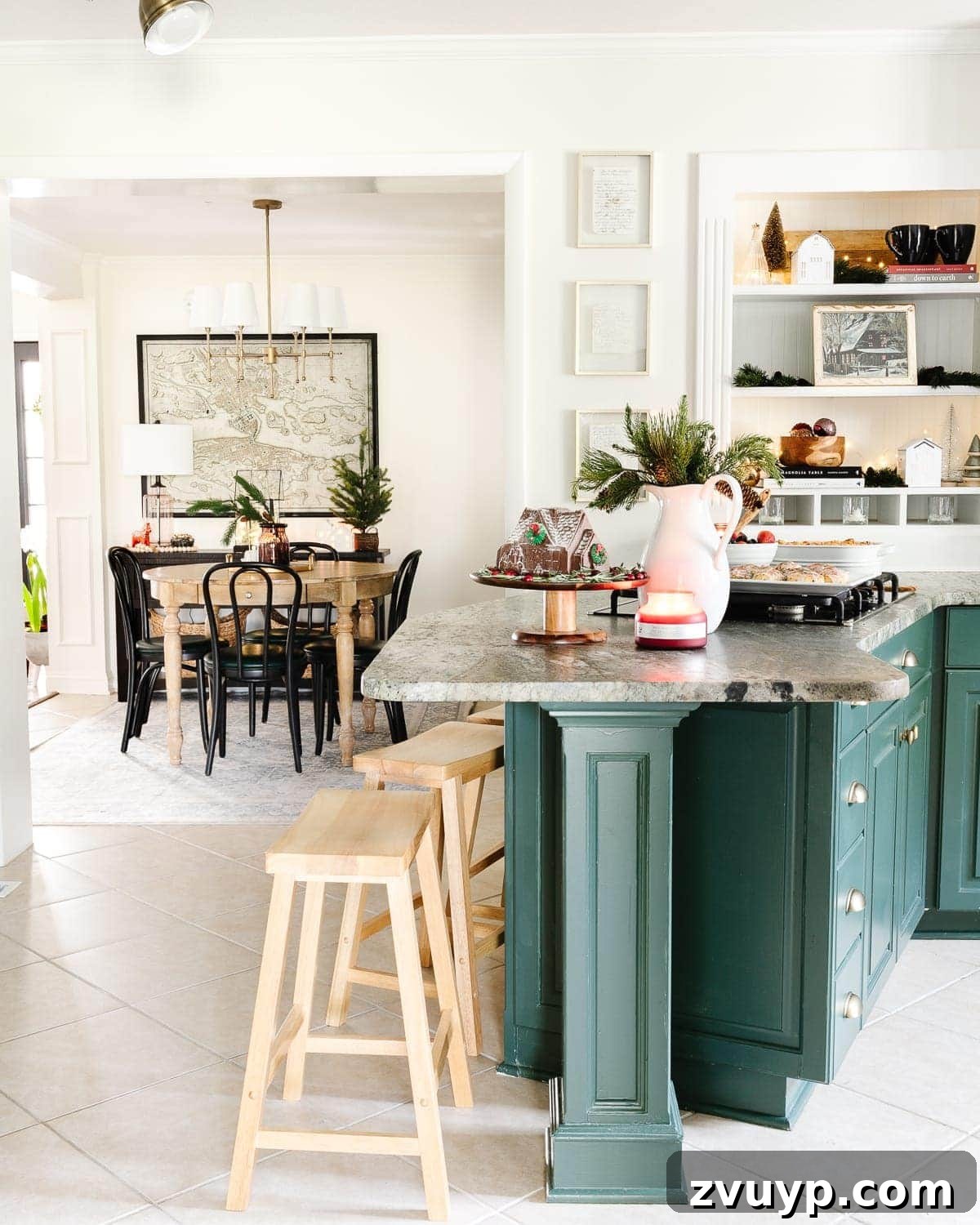 green and white kitchen decorated for Christmas with shelves and a breakfast nook