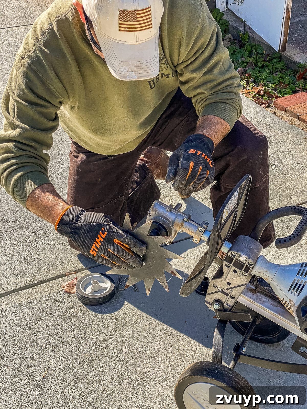Weekend Wonder: DIY Pea Gravel Fire Pit 13 Using a STIHL Yard Boss with an edger attachment to cut a clean line along the patio outline.