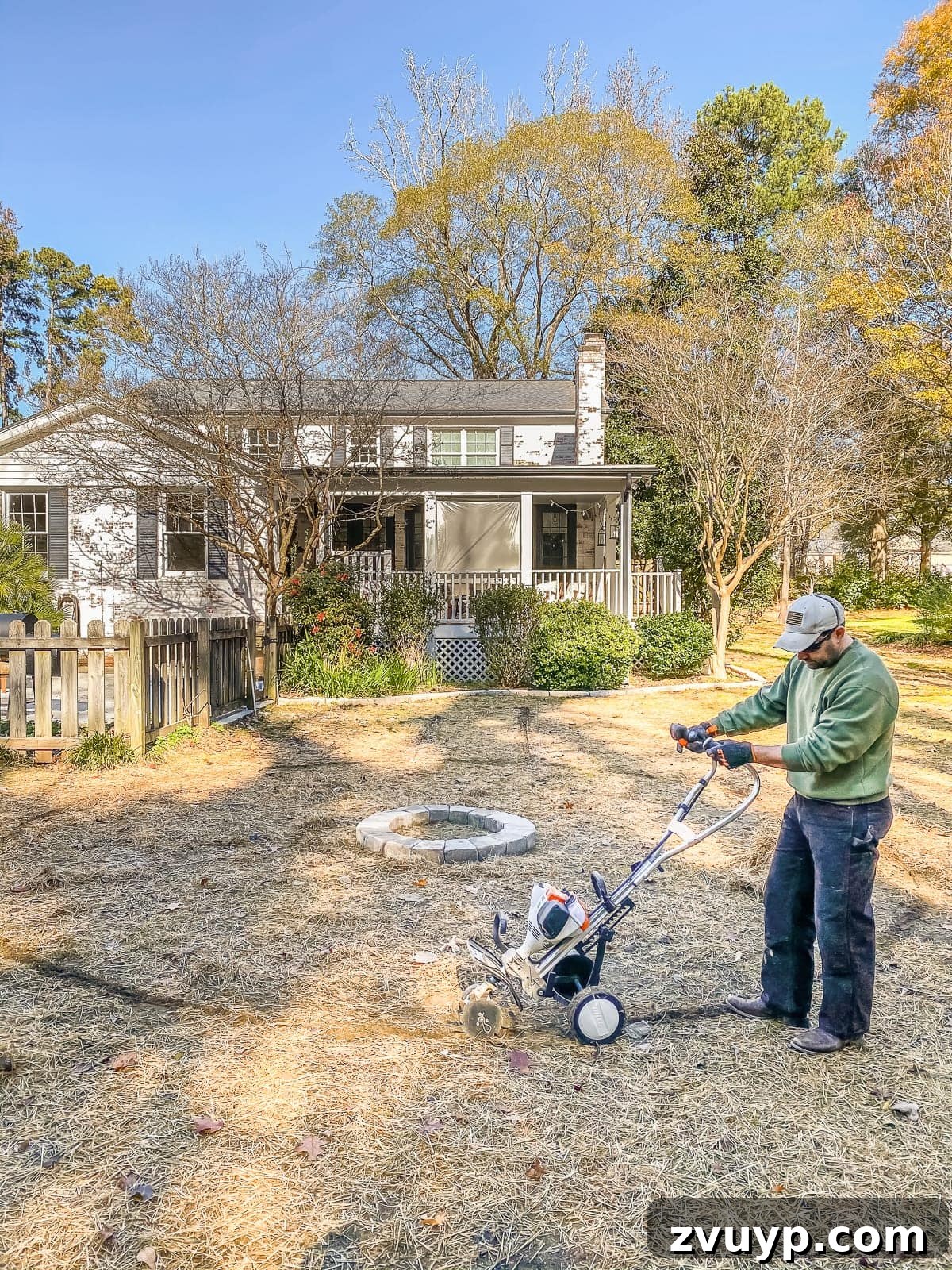 Weekend Wonder: DIY Pea Gravel Fire Pit 15 Using the STIHL Yard Boss with a cultivator attachment to remove grass and prepare the ground for the fire pit.