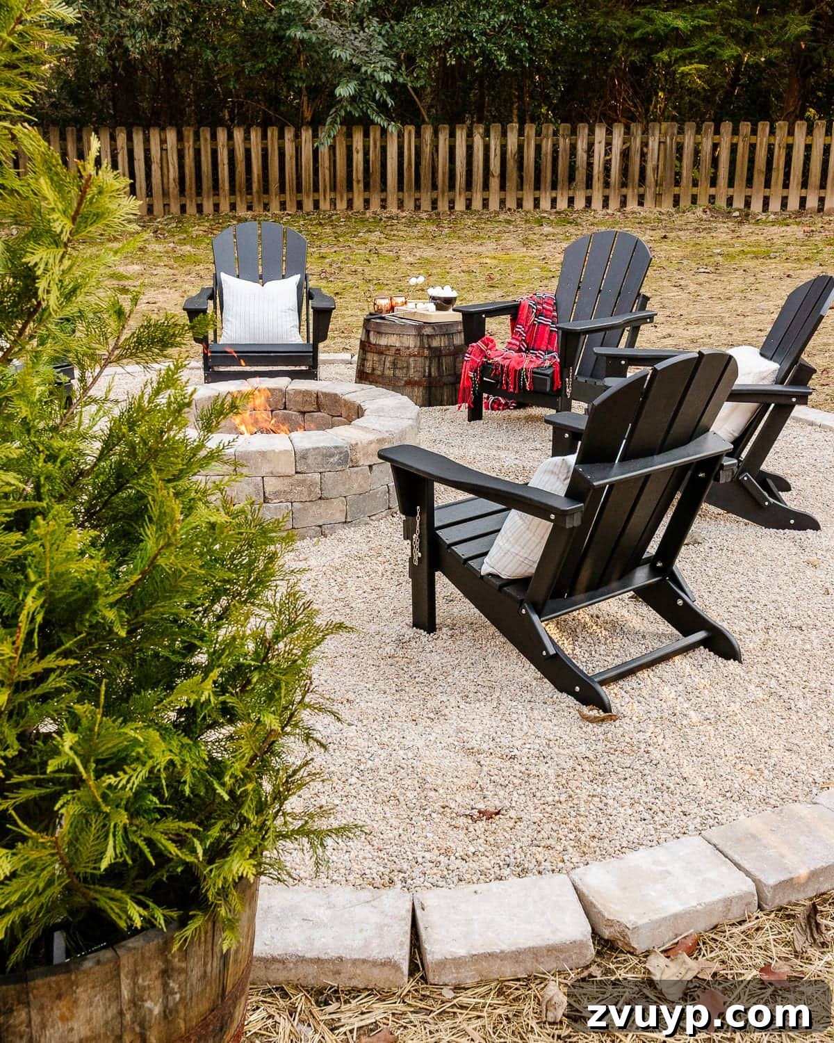 Weekend Wonder: DIY Pea Gravel Fire Pit 25 A durable DIY backyard fire pit with pea gravel, stone edgers, and comfortable Adirondack chairs.