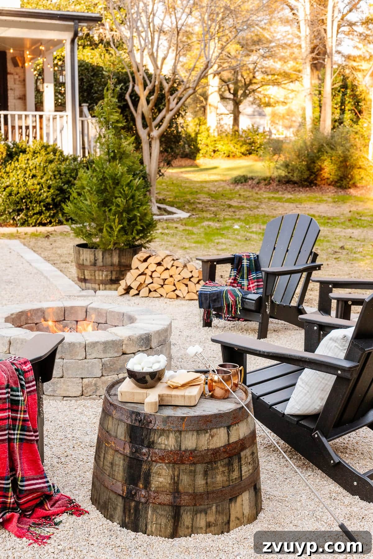 Weekend Wonder: DIY Pea Gravel Fire Pit 26 A homemade fire pit with pea gravel, stone edgers, and Adirondack chairs, featuring a barrel planter as a side table.