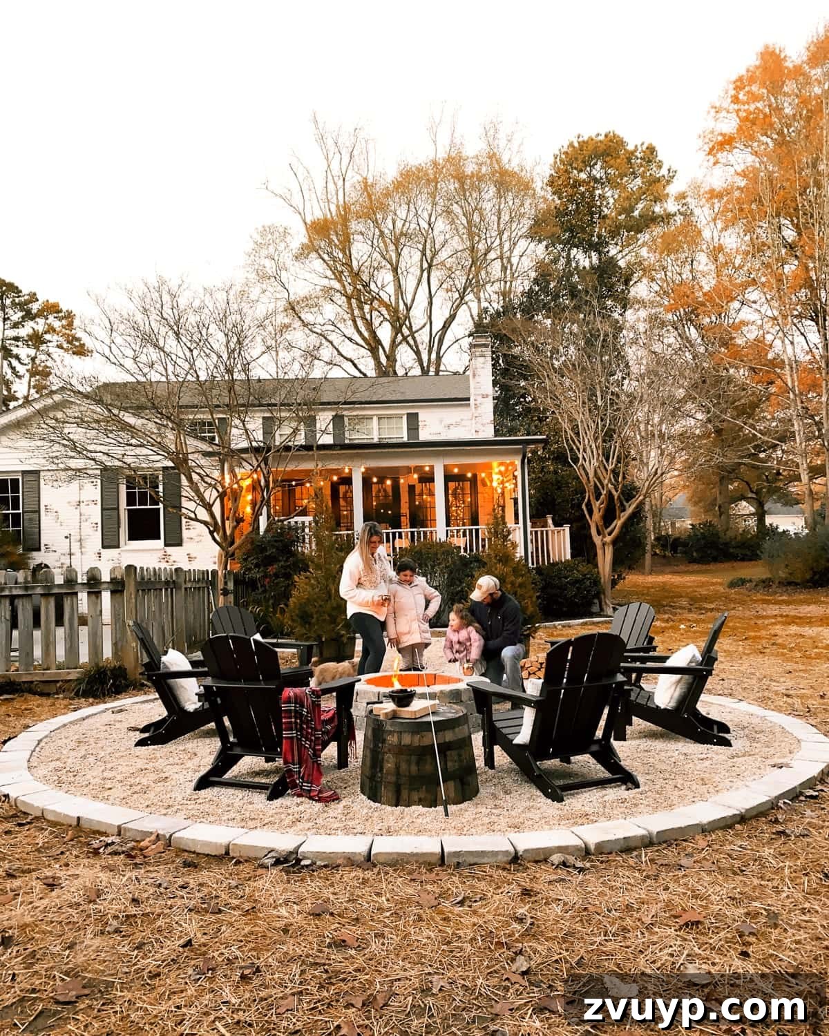 Weekend Wonder: DIY Pea Gravel Fire Pit 32 A stone DIY fire pit with pea gravel and Adirondack chairs, symbolizing the completed backyard project.