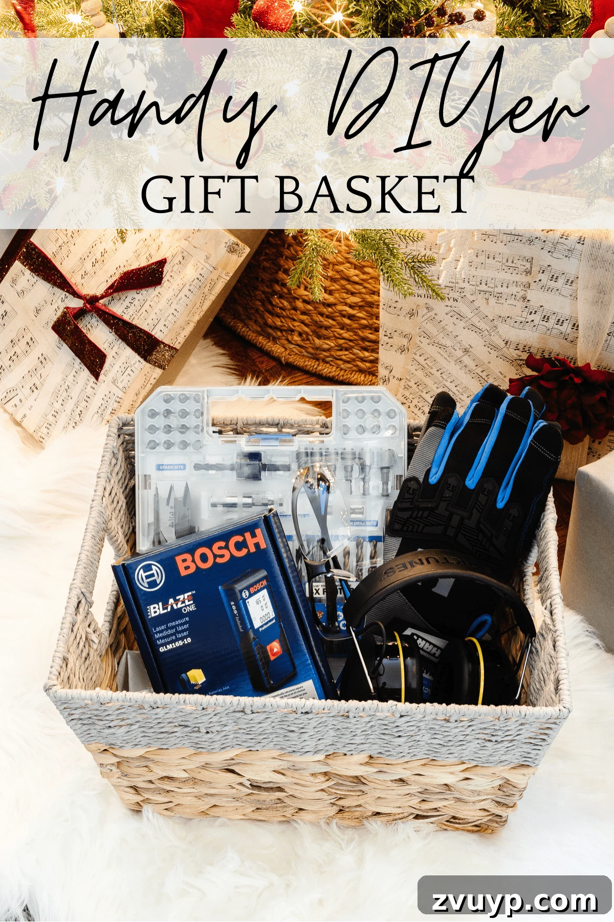50 Festive Hamper Inspirations 6 DIYer Gift Basket with earmuffs, safety glasses, laser measure, work gloves, and a drill bit set.