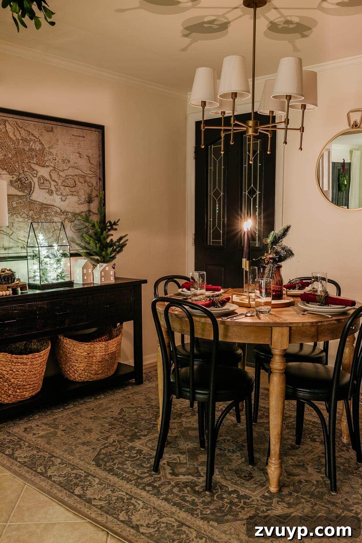 The 2020 Candlelit Yuletide Journey 10 A serene hallway decorated for Christmas with a console table and mirror