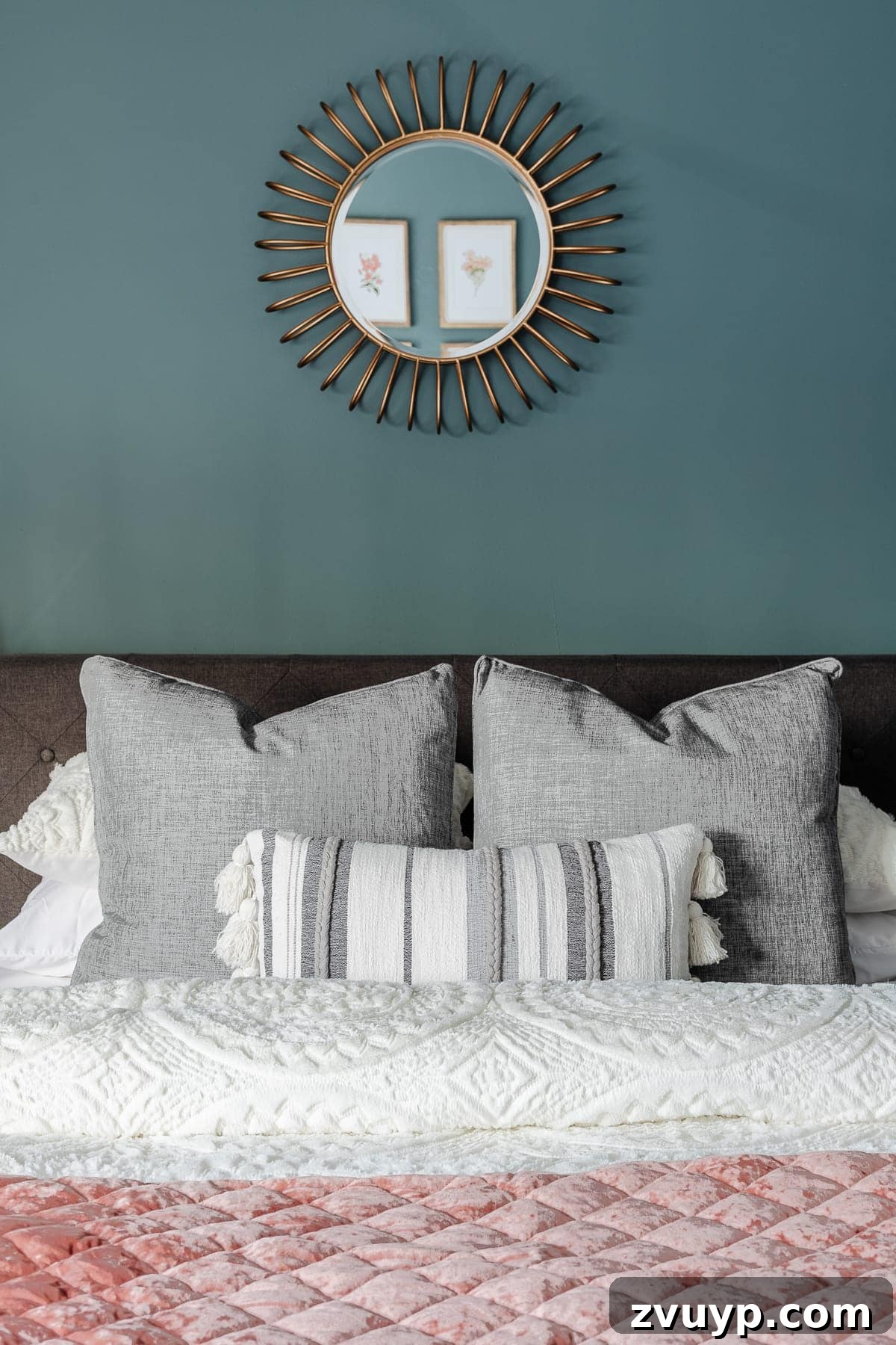 Crafting a Spa Sanctuary: Bedroom Decor for Ultimate Serenity 10 Soft, layered bedding in neutral gray and stripes on a teal bedroom bed