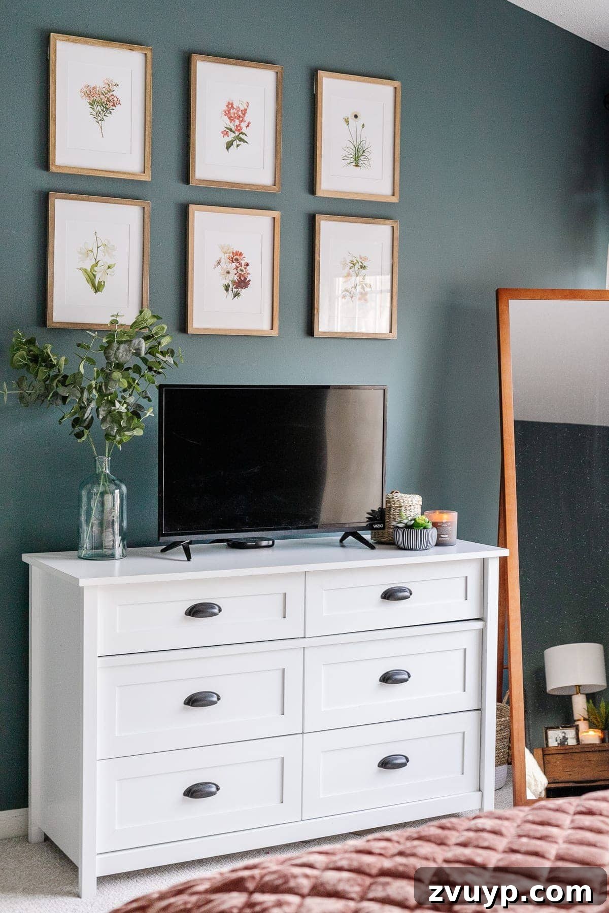 Crafting a Spa Sanctuary: Bedroom Decor for Ultimate Serenity 20 Close-up of framed botanical art prints with blush tones