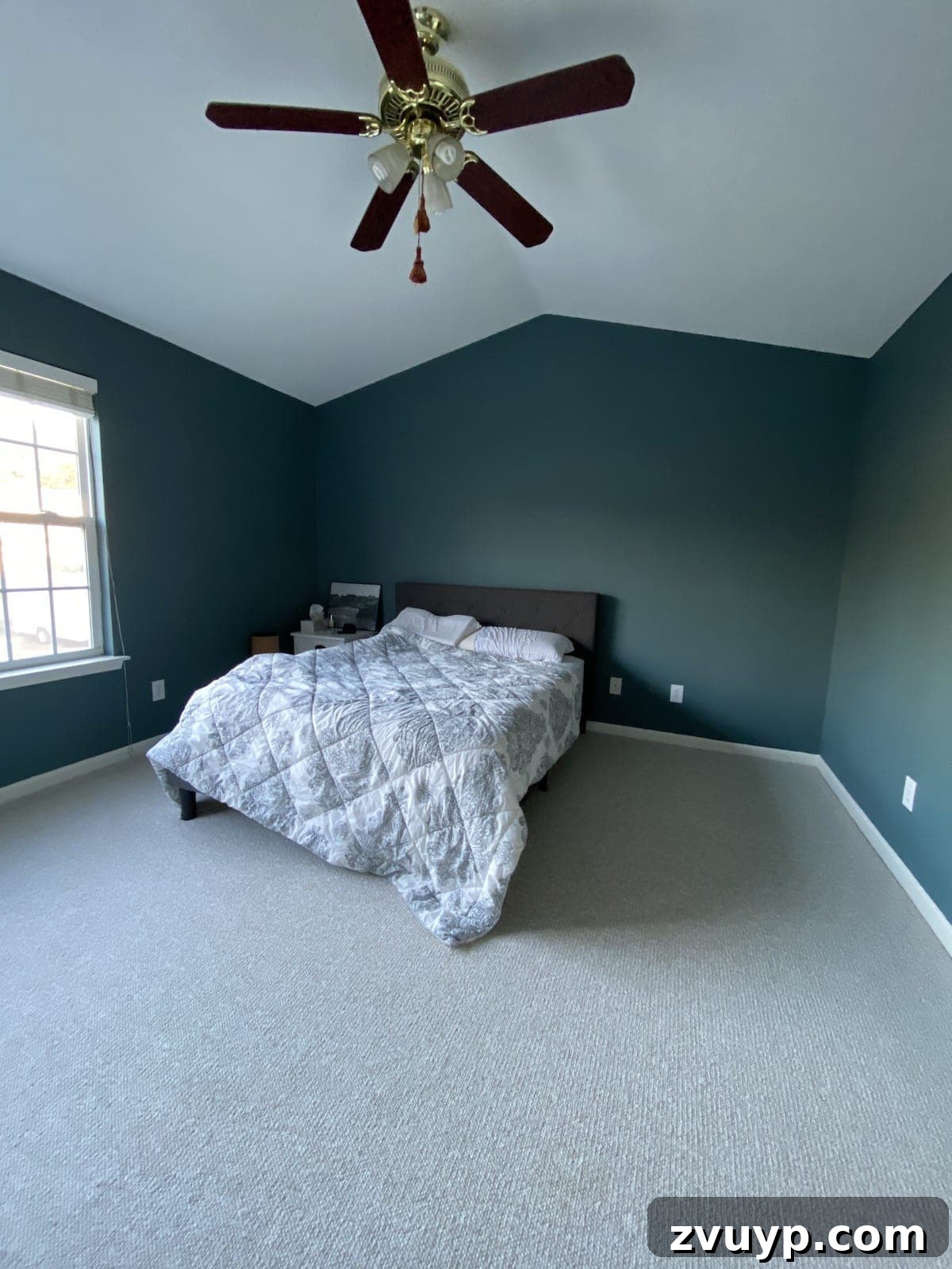 Crafting a Spa Sanctuary: Bedroom Decor for Ultimate Serenity 3 Before shot of a bedroom with teal walls and existing furniture