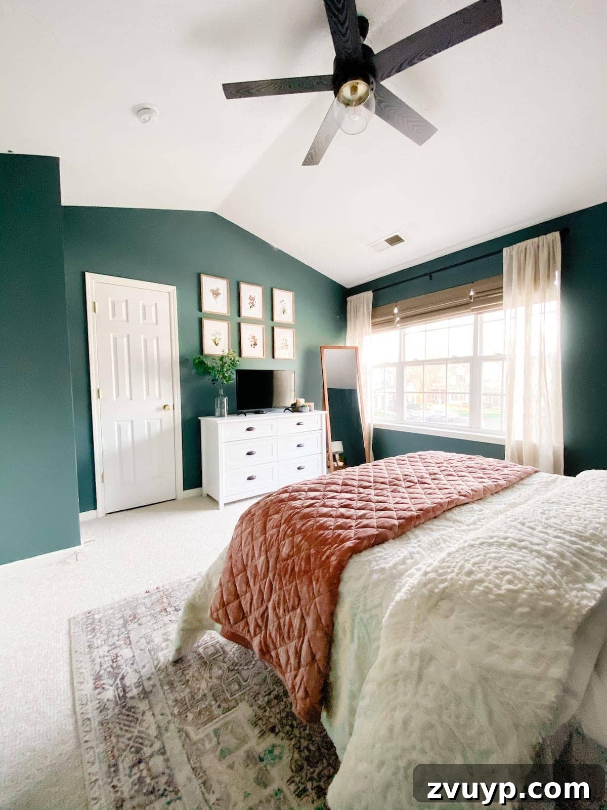 Crafting a Spa Sanctuary: Bedroom Decor for Ultimate Serenity 5 After photo of a serene teal and blush bedroom with new decor