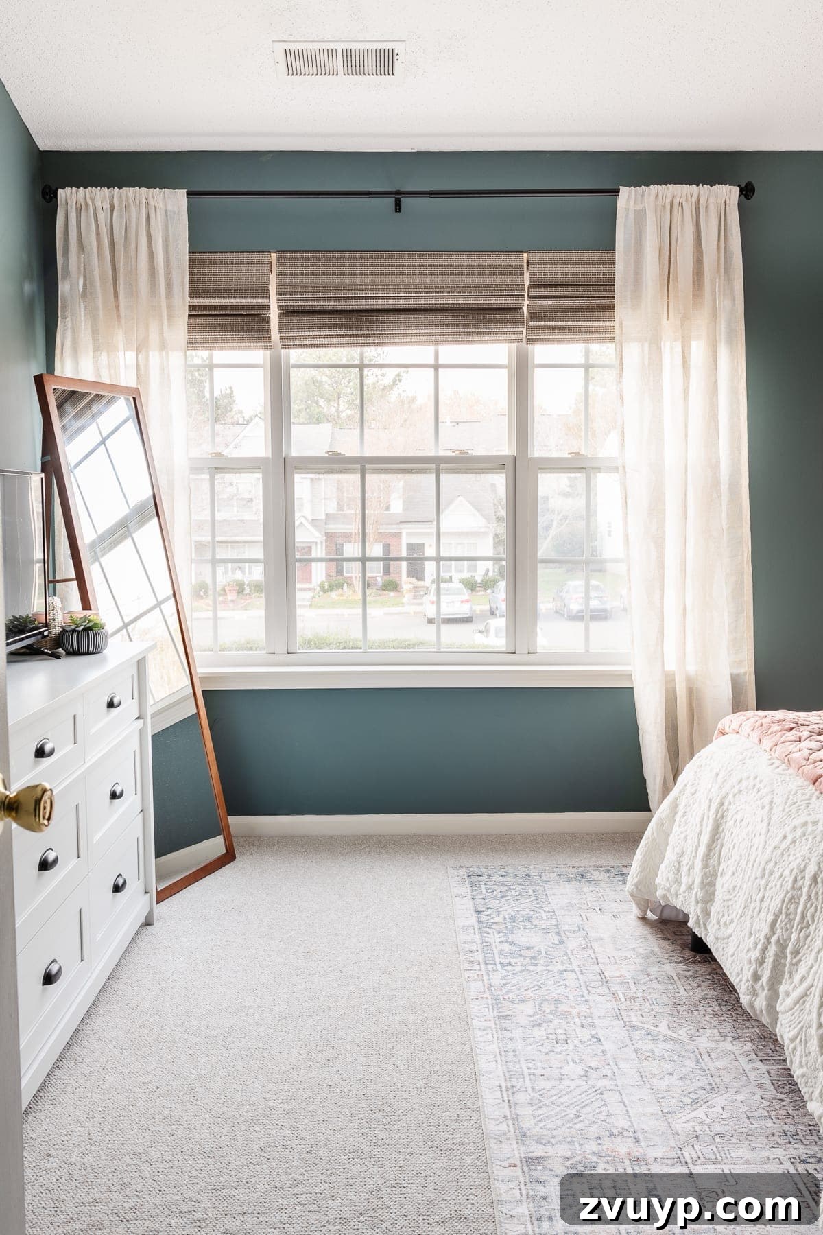 Crafting a Spa Sanctuary: Bedroom Decor for Ultimate Serenity 7 Light, airy sheer curtains in a teal and blush bedroom