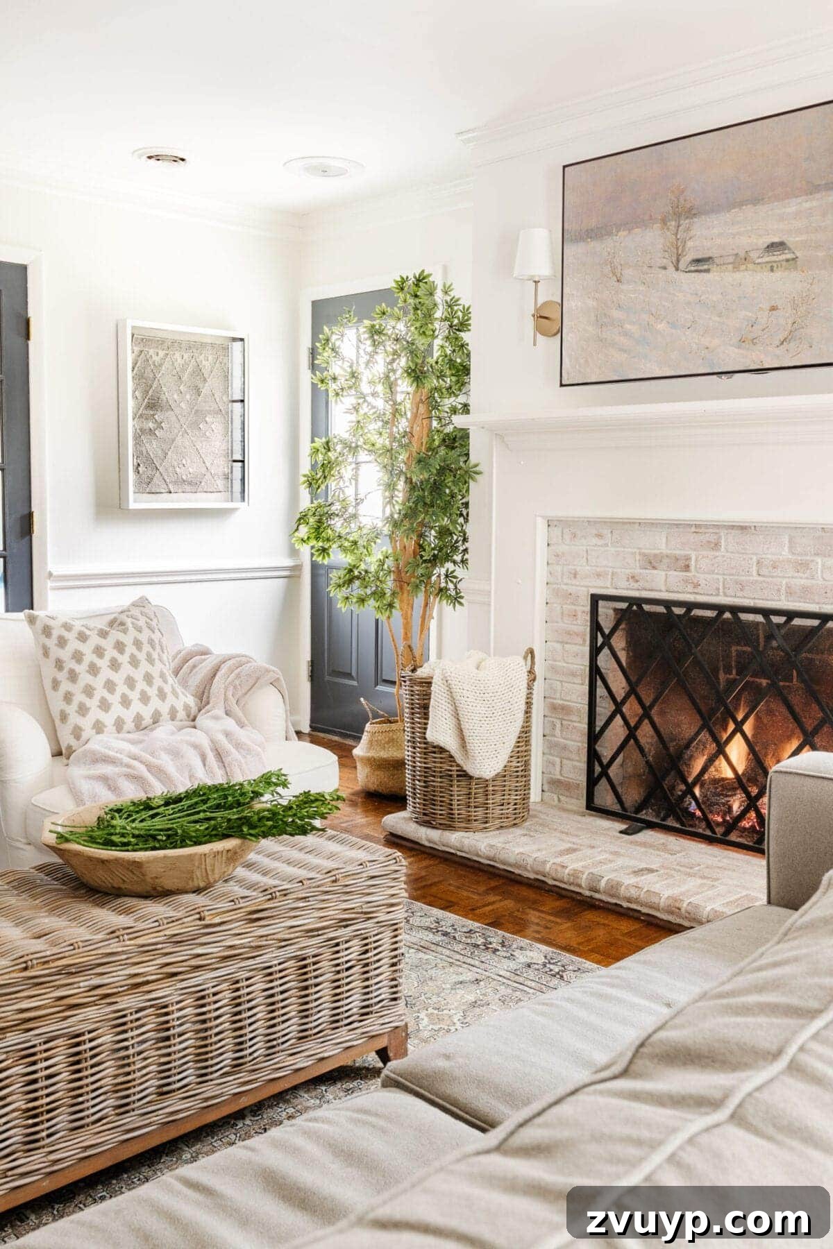 Wider shot of the living room corner with the DIY textile art, showing it as a focal point.
