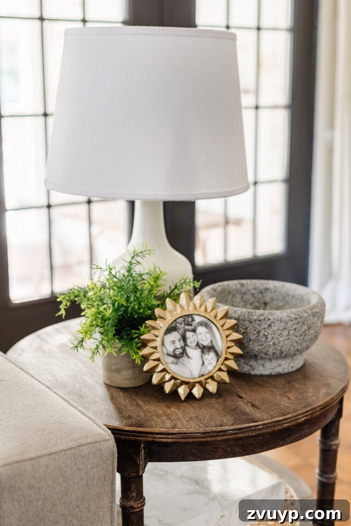 Seasonal Snuggle Spot My Favorite Winter Decor 8 Simple yet sophisticated winter decor on an end table, showcasing a plant and other decorative items.