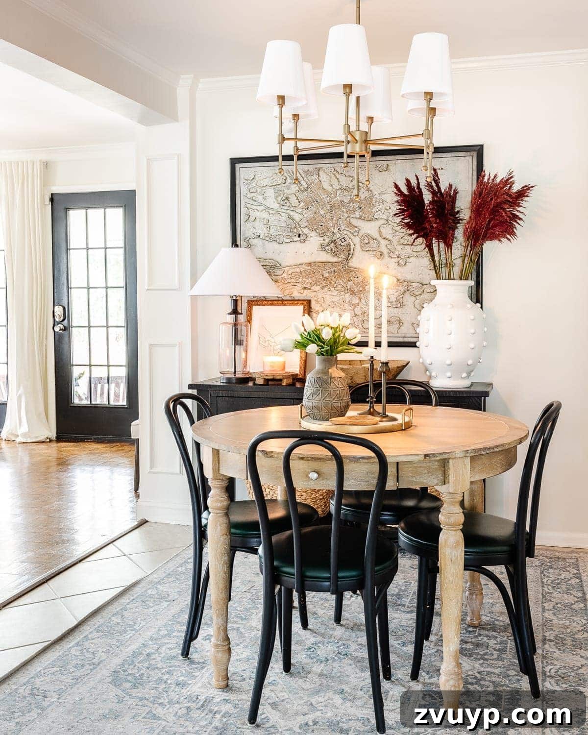 Chic Valentine's Ambiance 2 Subtle Valentine's Day decor featuring white tulips, brass candleholders, and a marble tray on a wooden table.