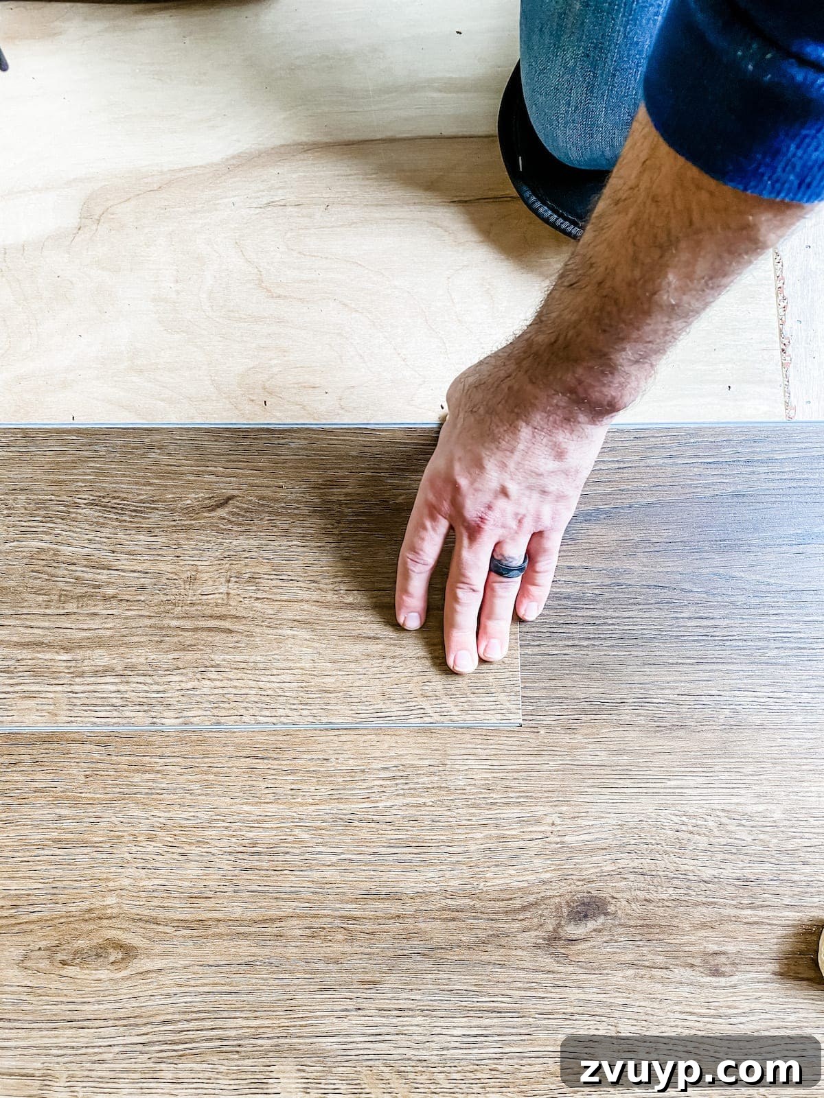 How to install luxury vinyl plank flooring, locking planks end to end