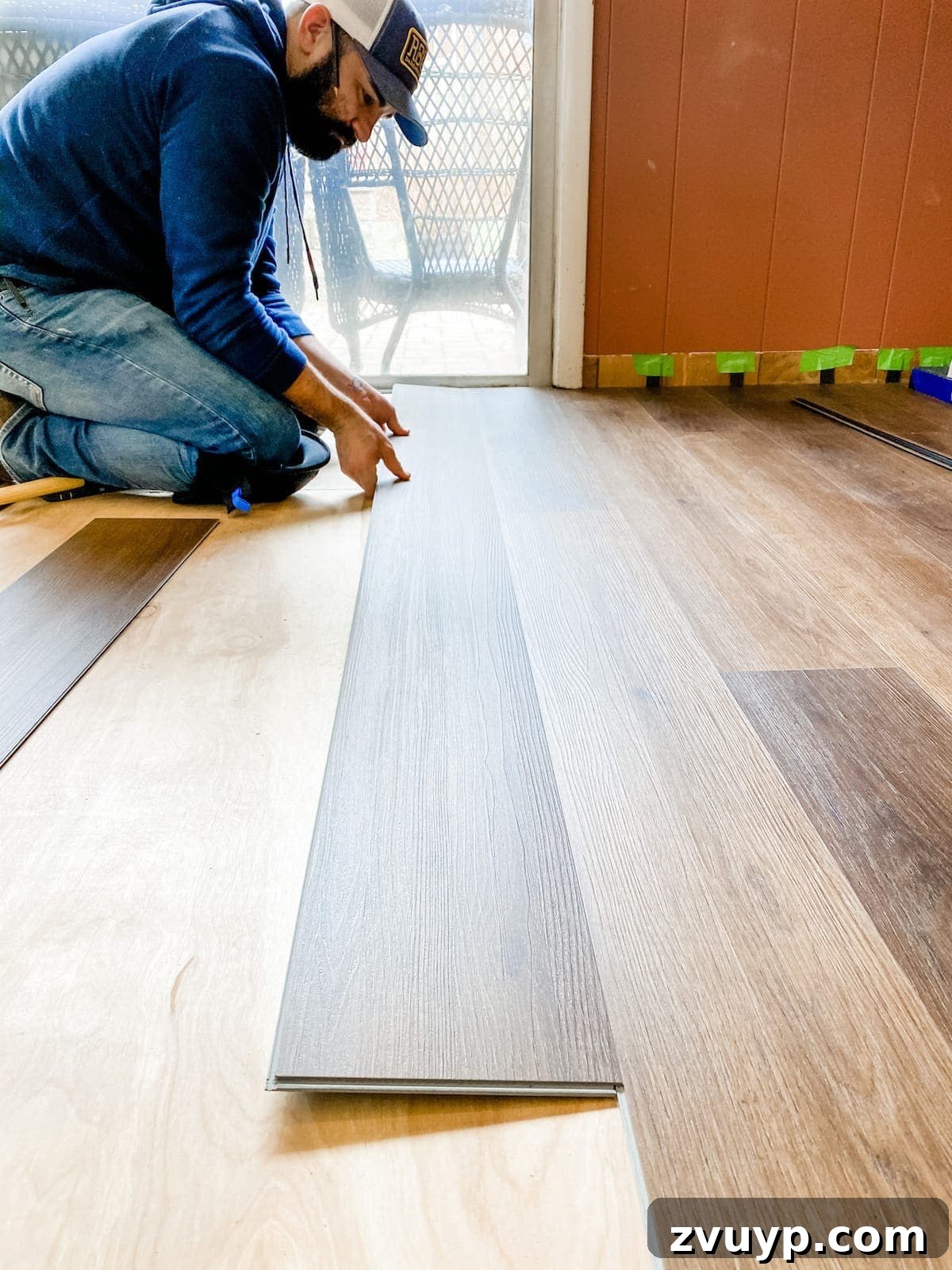 How to install luxury vinyl plank flooring, angling the long edge into place